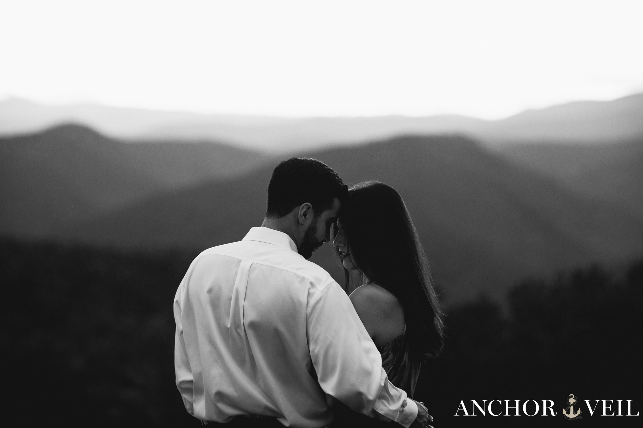 facing each other during the Stone Mountain Engagement Session