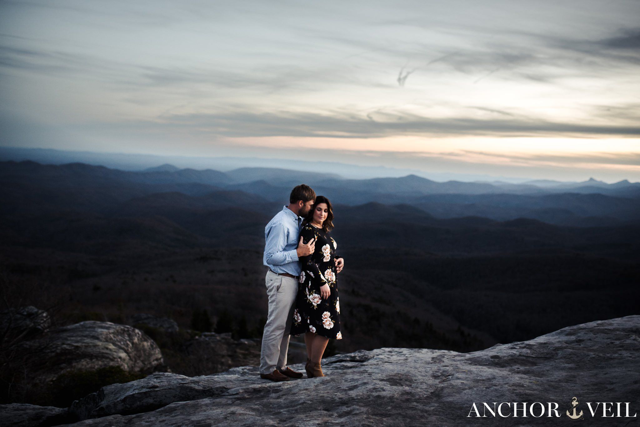 holding her from behind on rough ridge during the Blue Ridge Mountains Engagement Session