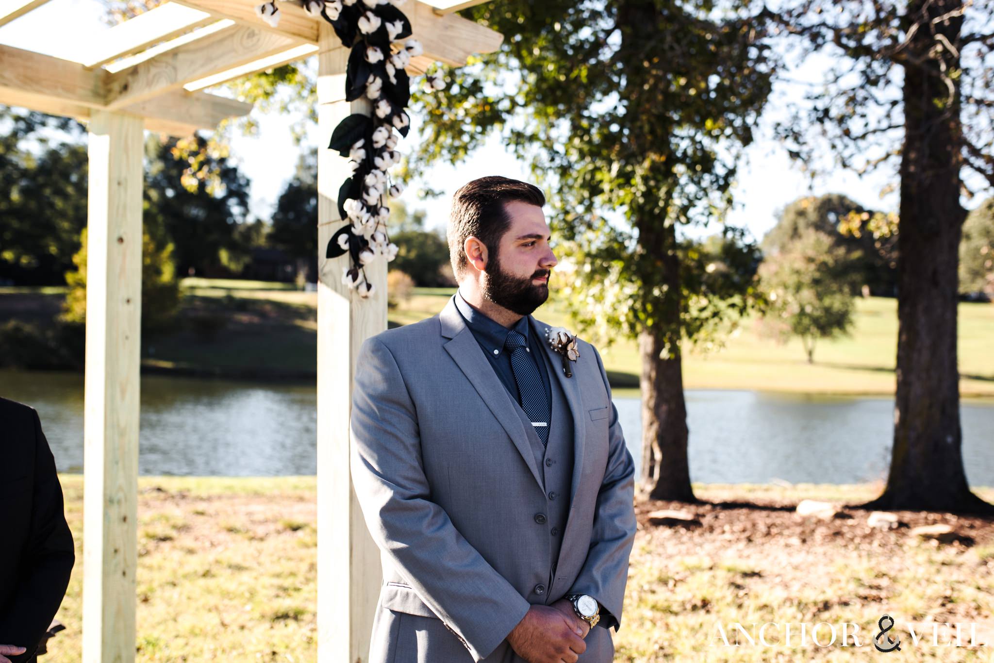 groom waiting for bride to walk down the aisle during the Millikan Farms Wedding