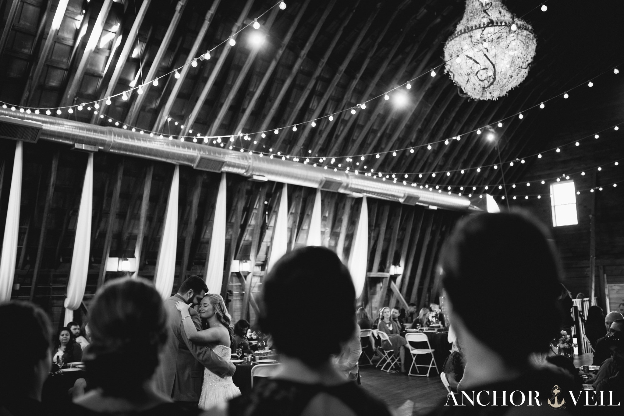 first dance in between the people's head during the Millikan Farms Wedding