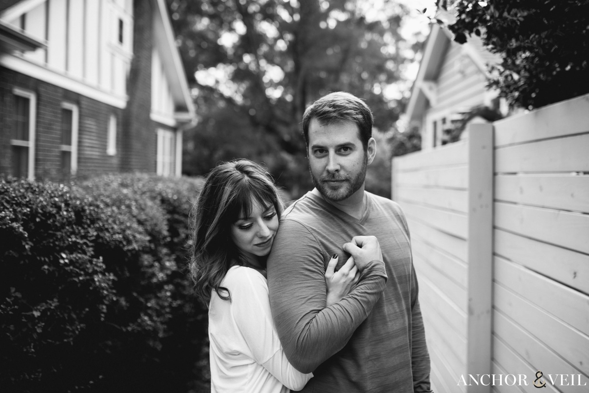 holding her hand tight during the Charlotte Engagement Session