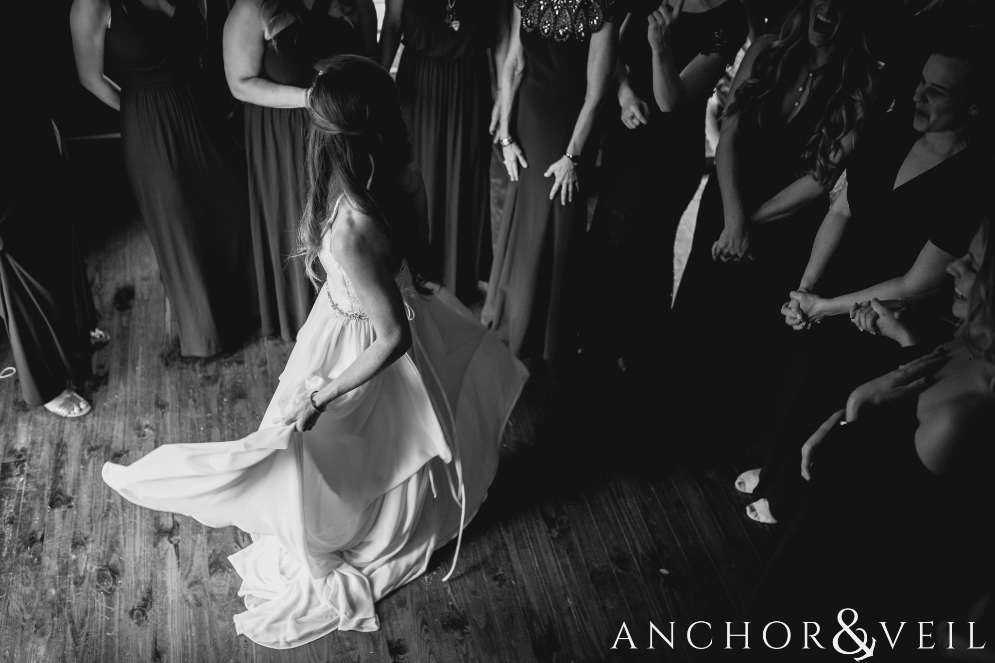 twirling in her dress During their University Laundry wedding in Dallas texas
