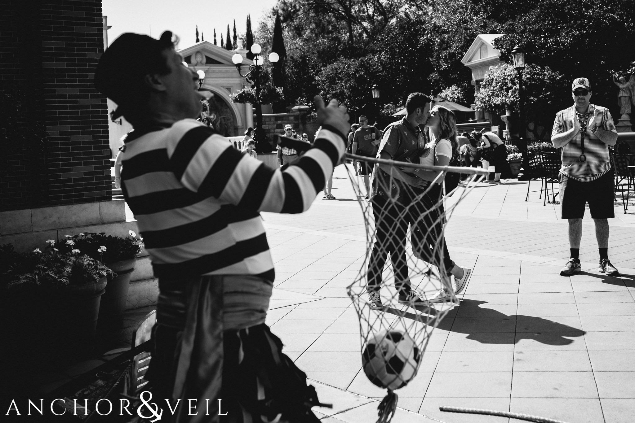 italian mime during their Disney world engagement session at Disney's Epcot