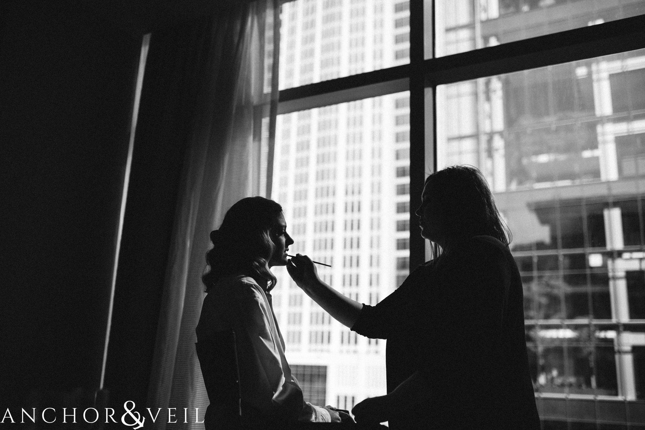 the buildings in the background during their ritz Carlton wedding in Uptown Charlotte NC