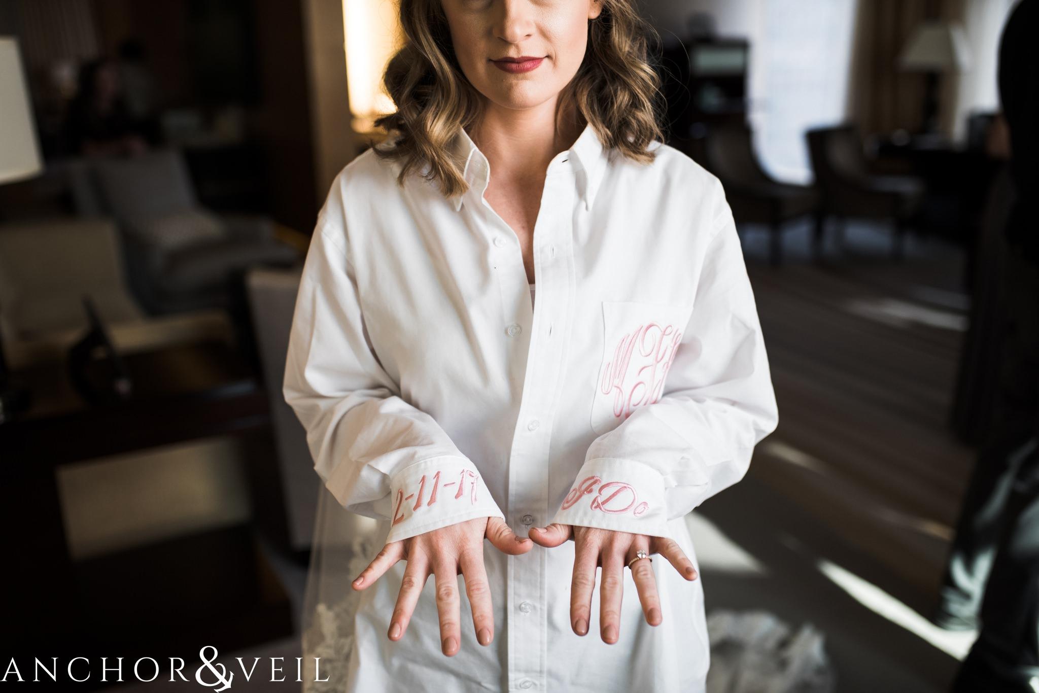I do dress while getting ready during their ritz Carlton wedding in Uptown Charlotte NC