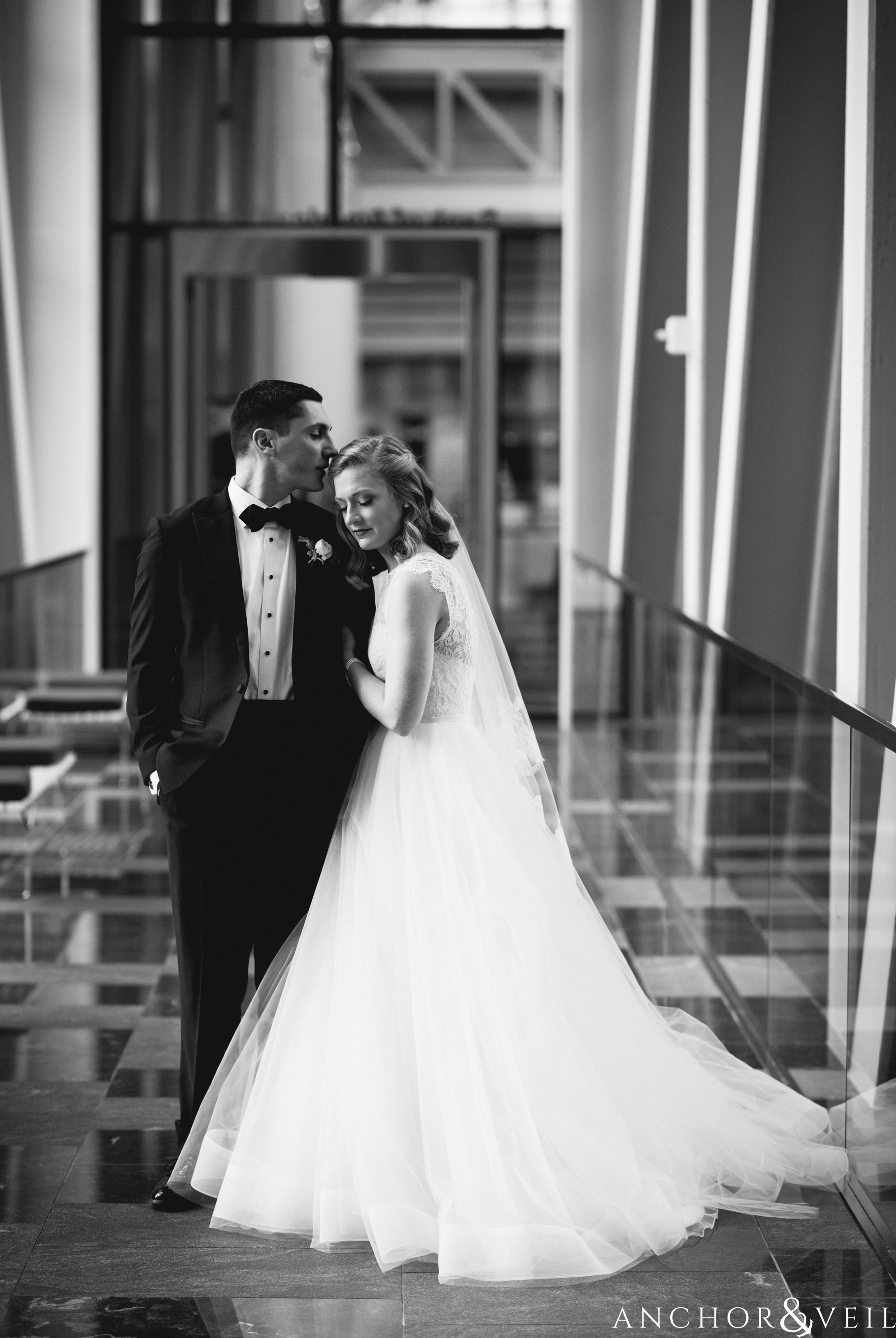 portraits in the hallway during their ritz Carlton wedding in Uptown Charlotte NC