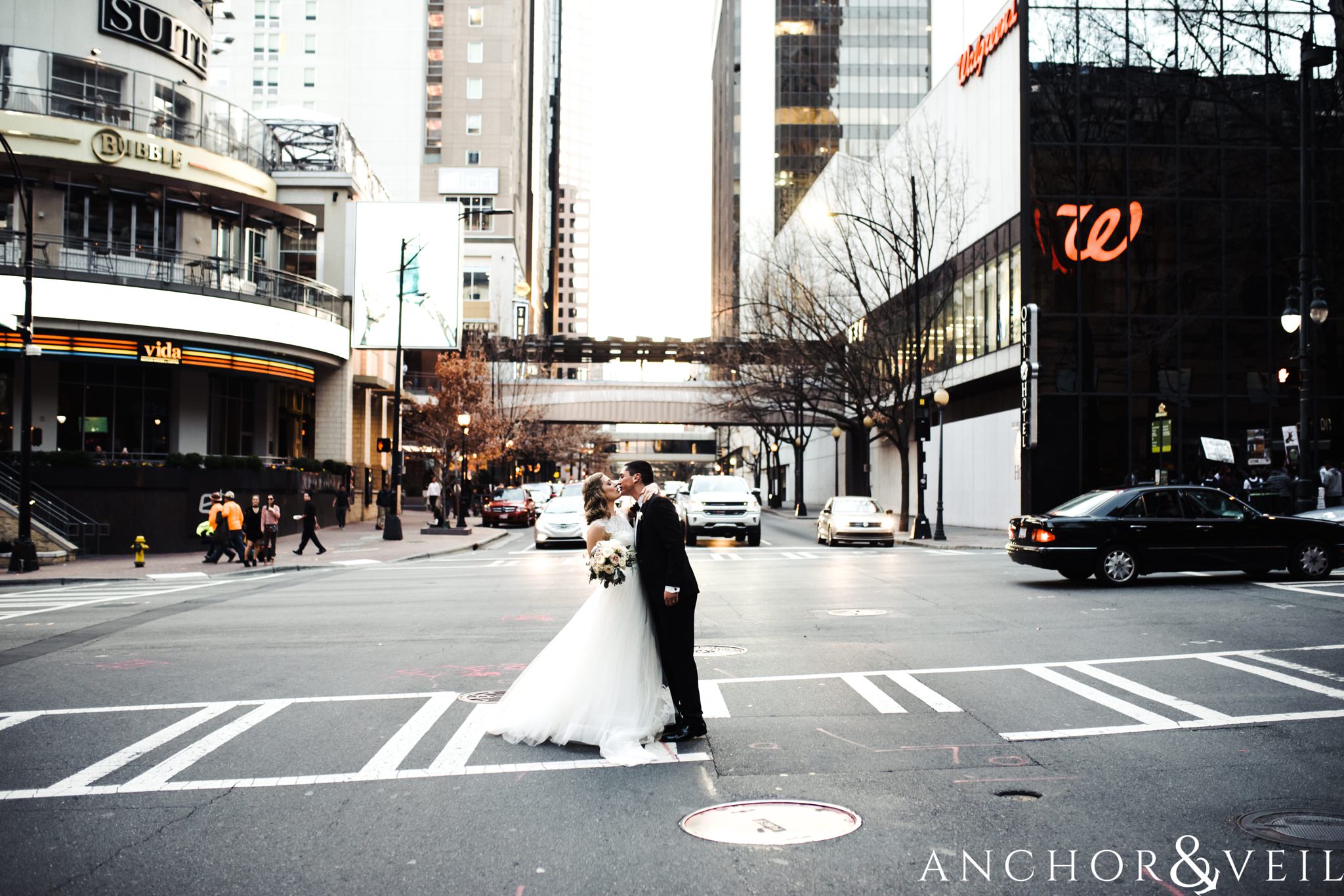 in the street portraits during their ritz Carlton wedding in Uptown Charlotte NC