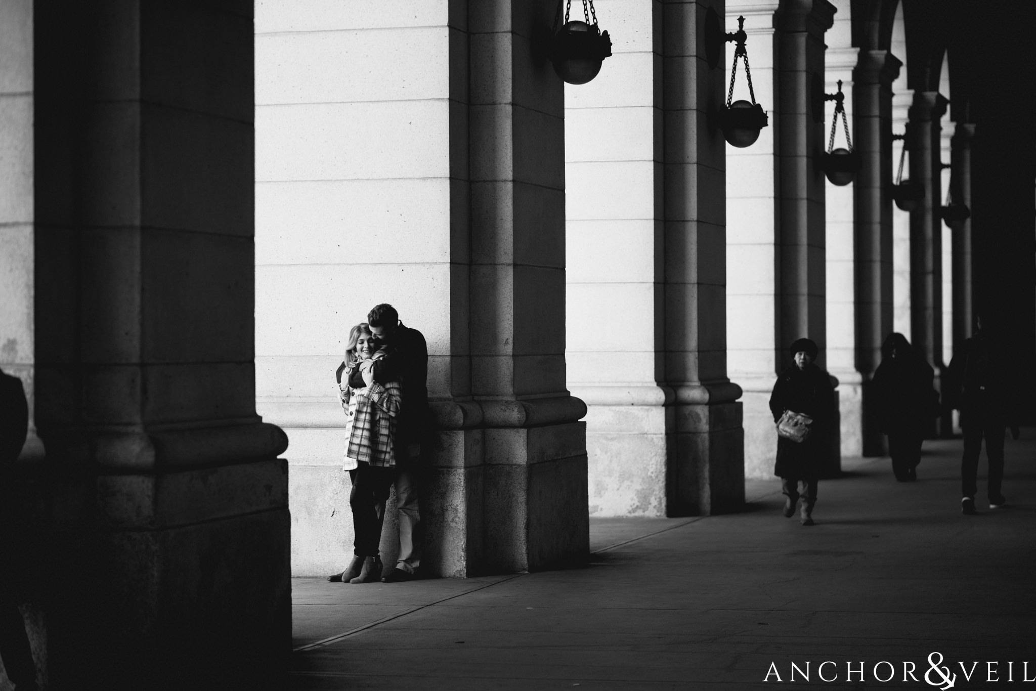 arches at union station during their Scenic Washington DC Engagement Session