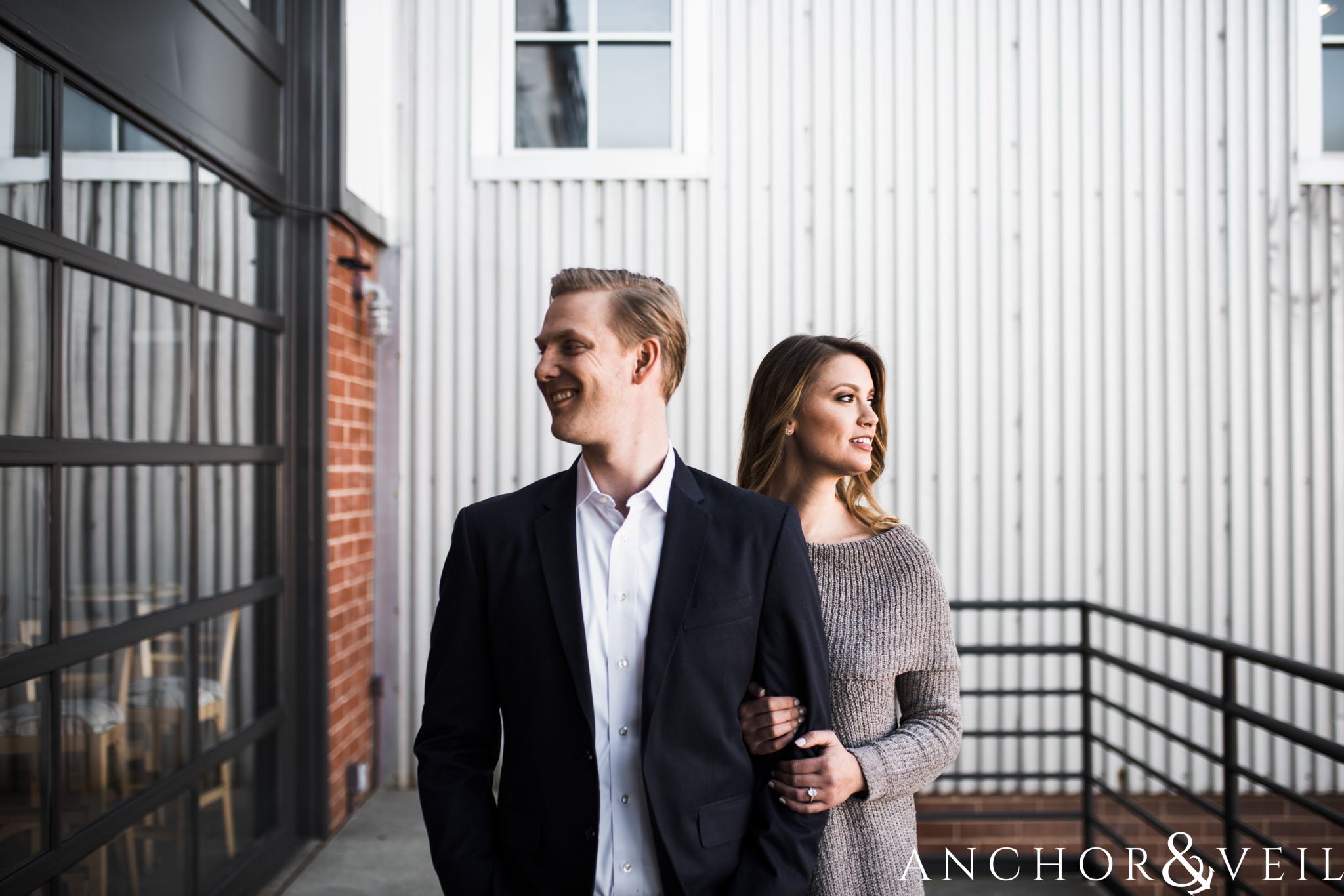 facing opposites during their shorthand Charlotte engagement session