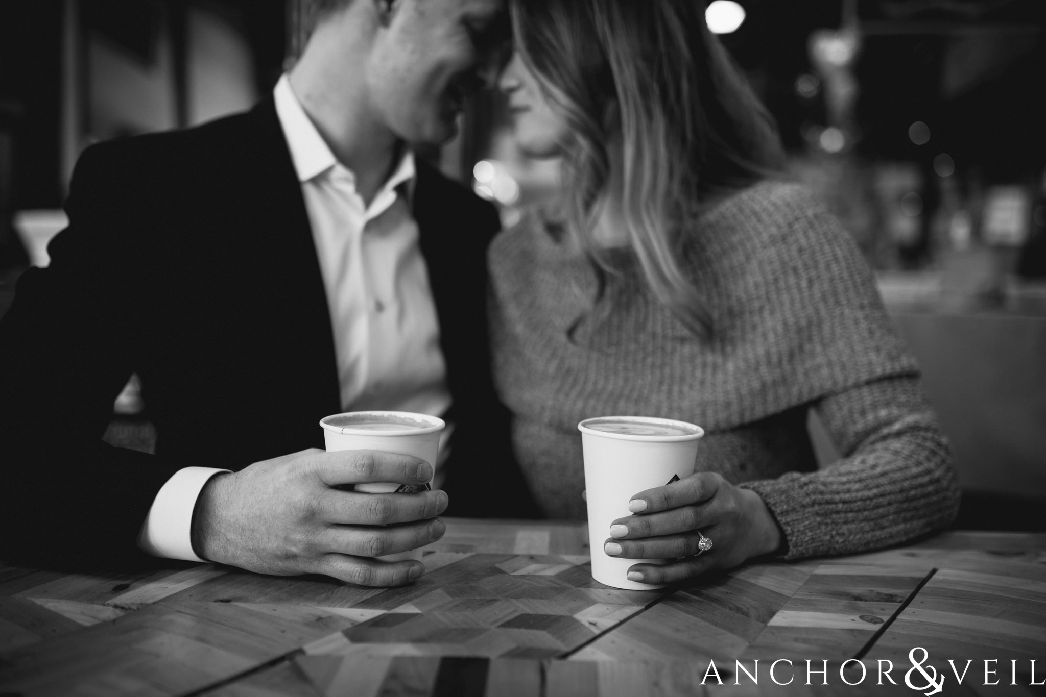 drinking coffee during their shorthand Charlotte engagement session