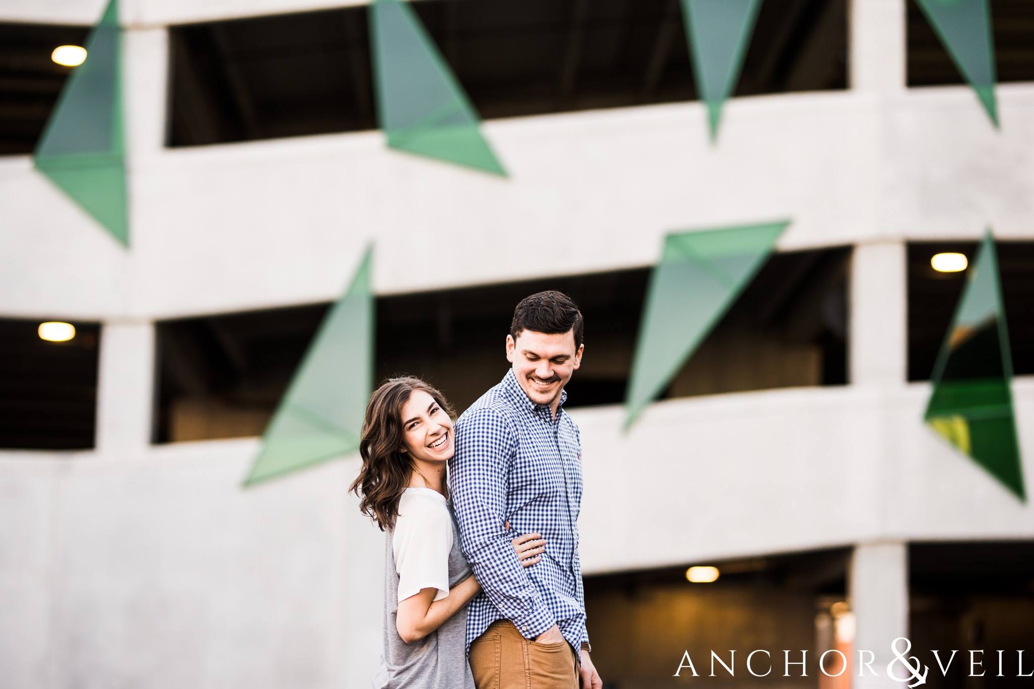 green triangles during their southend Charlotte and Jetton park engagement session