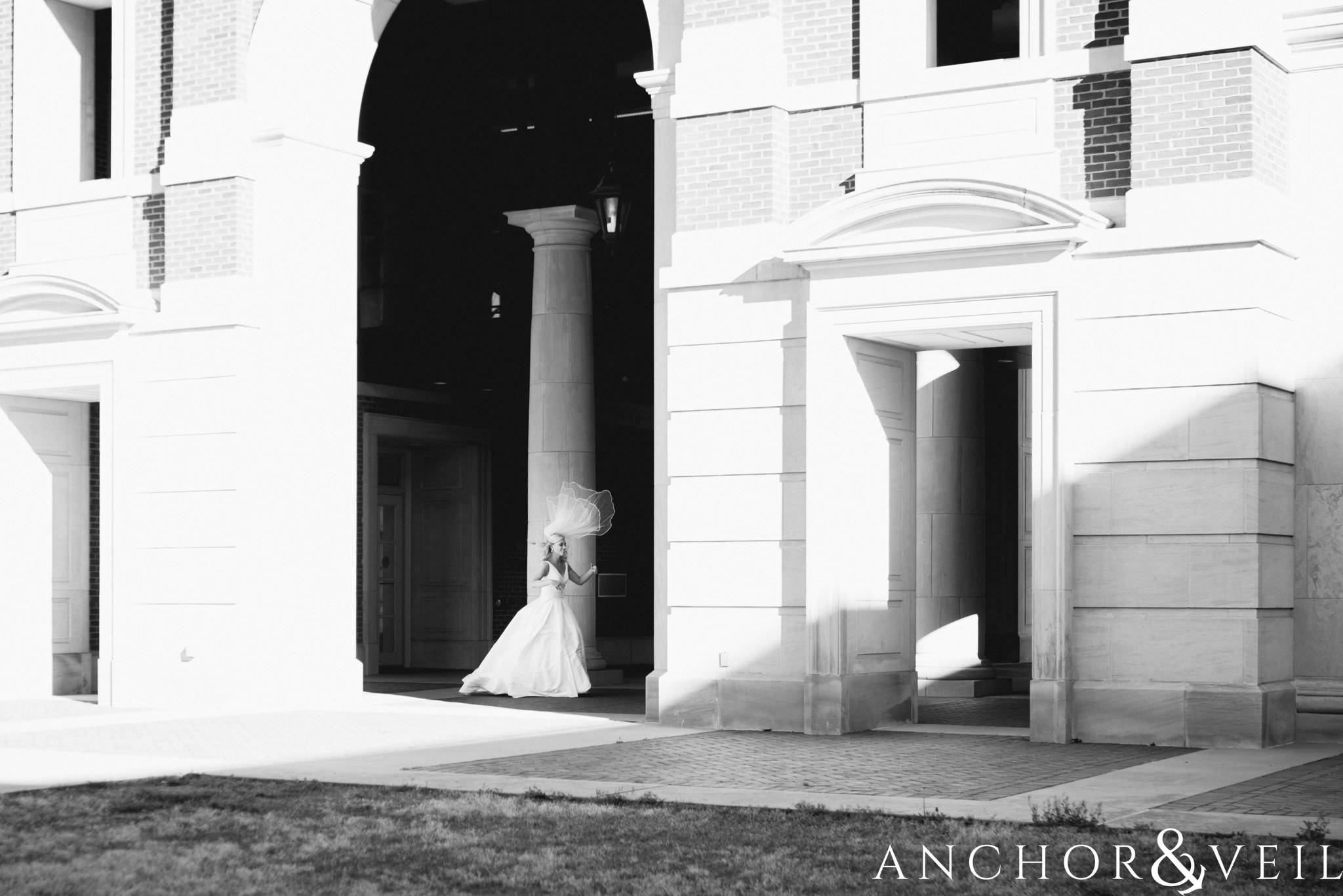 first look and wind during their Alabama Museum of Natural History Wedding