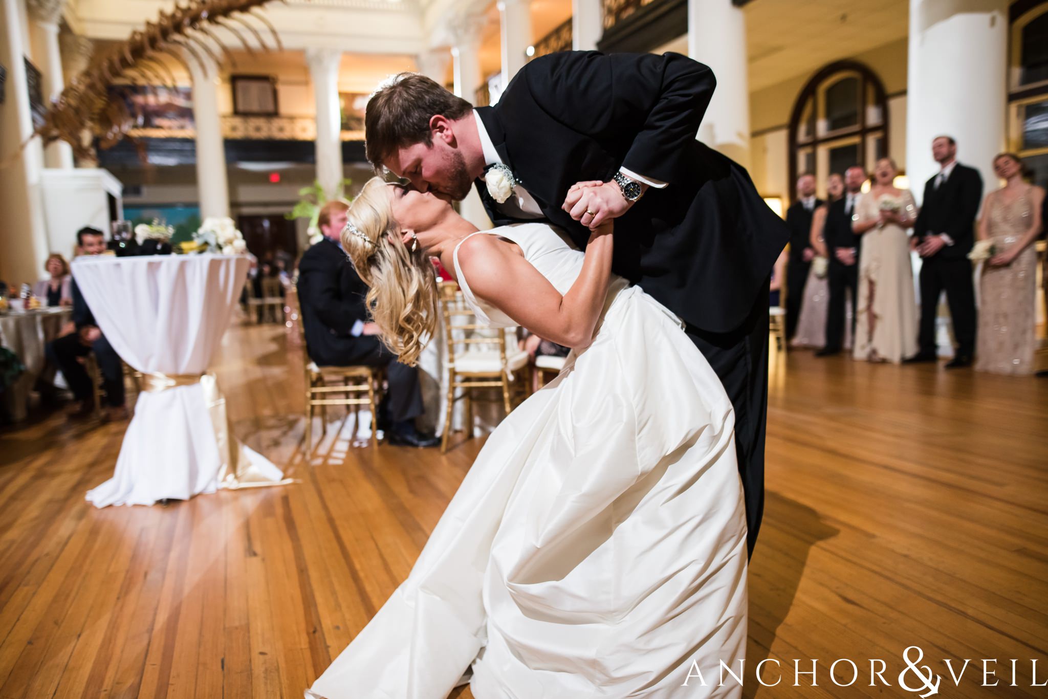 first dance with dinosaur during their Alabama Museum of Natural History Wedding