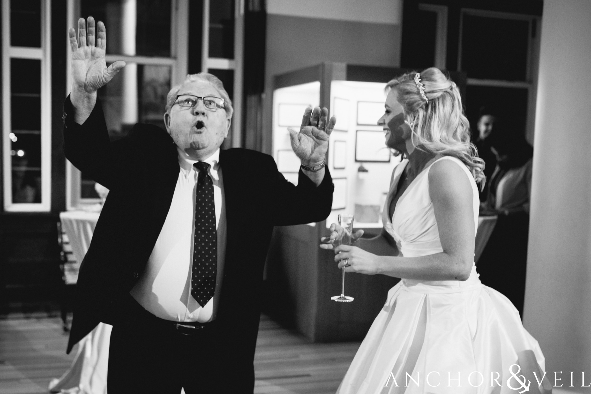dancing with grandpa during their Alabama Museum of Natural History Wedding