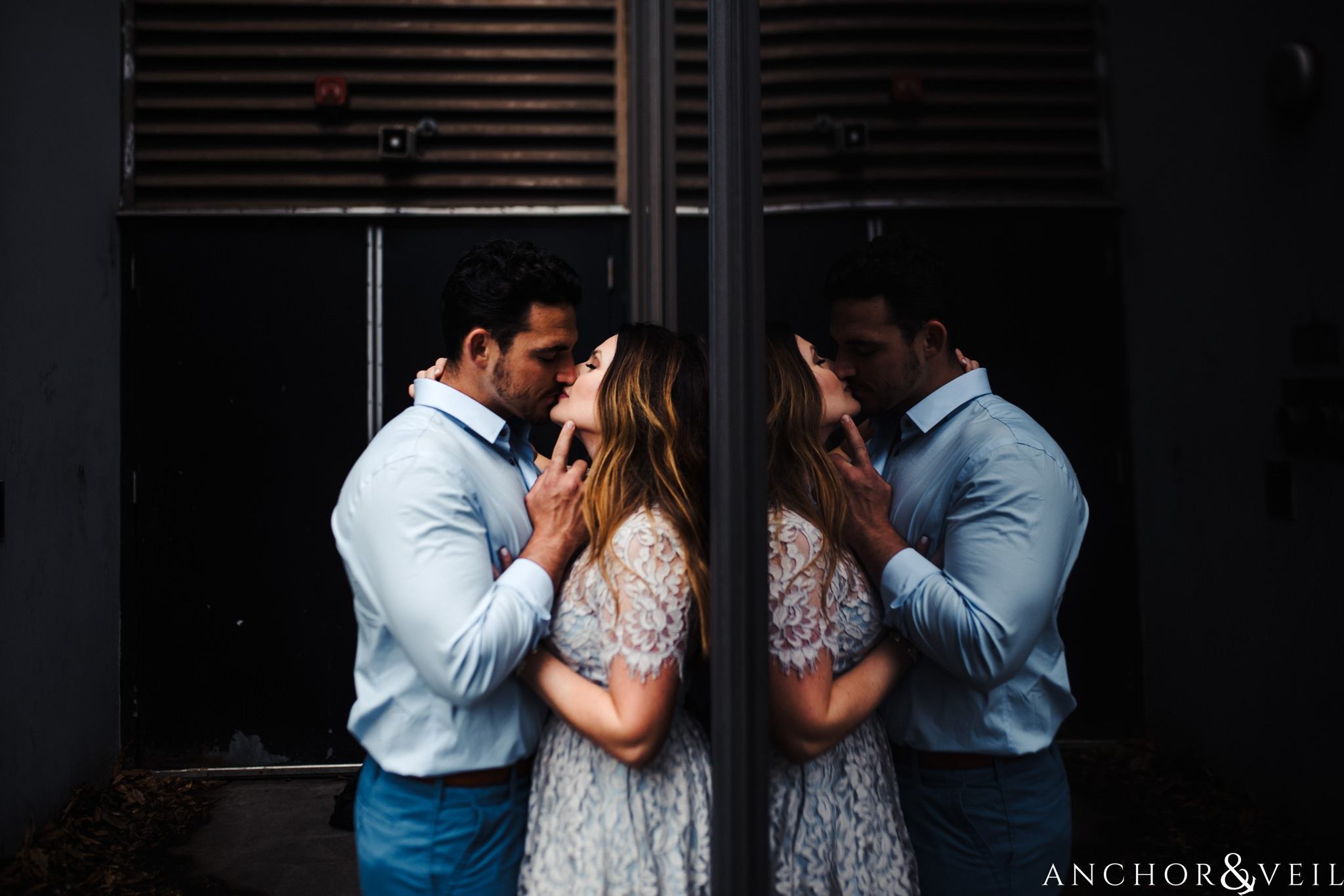reflections of love during their Uptown Charlotte NC Engagement Session
