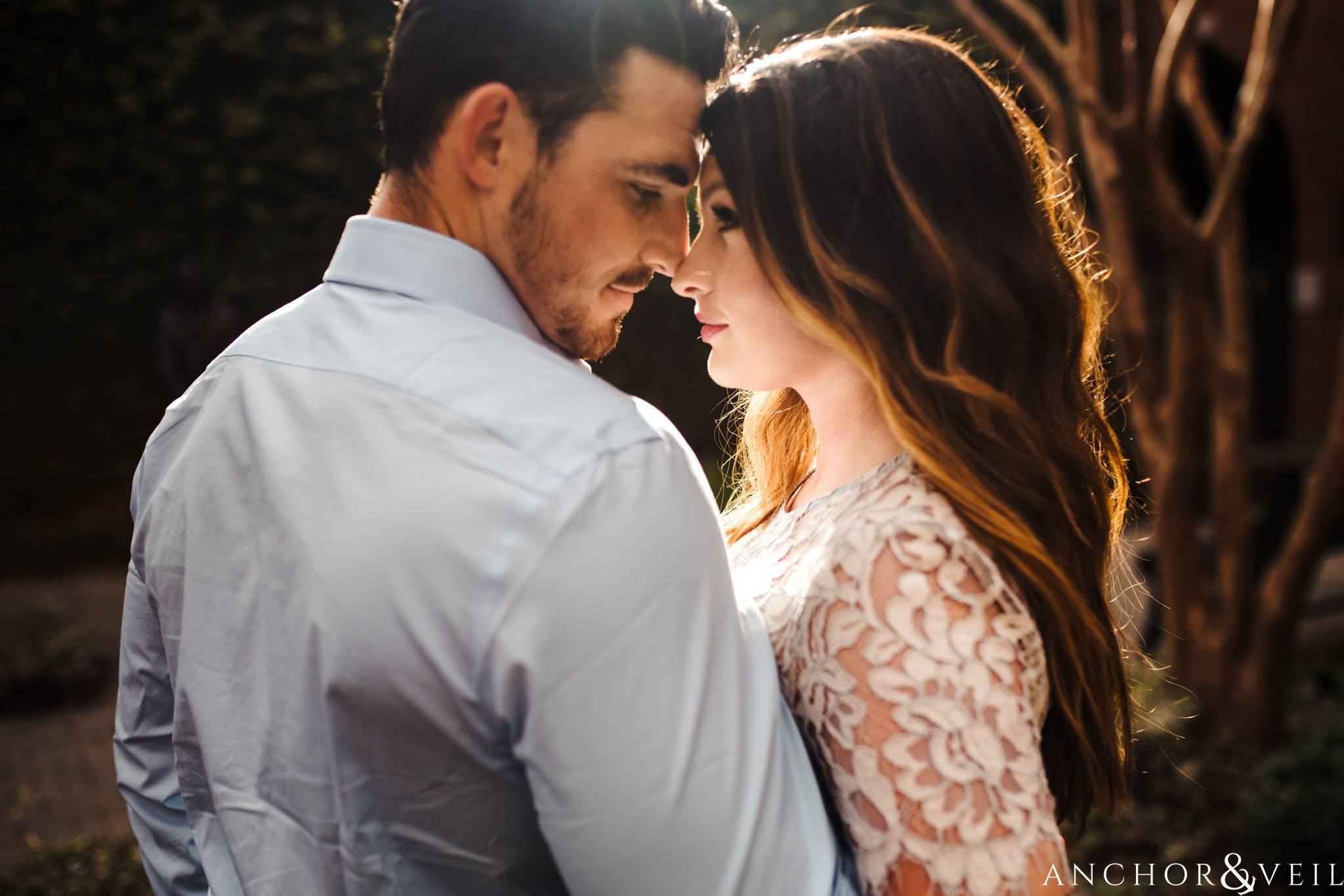 getting close during their Uptown Charlotte NC Engagement Session