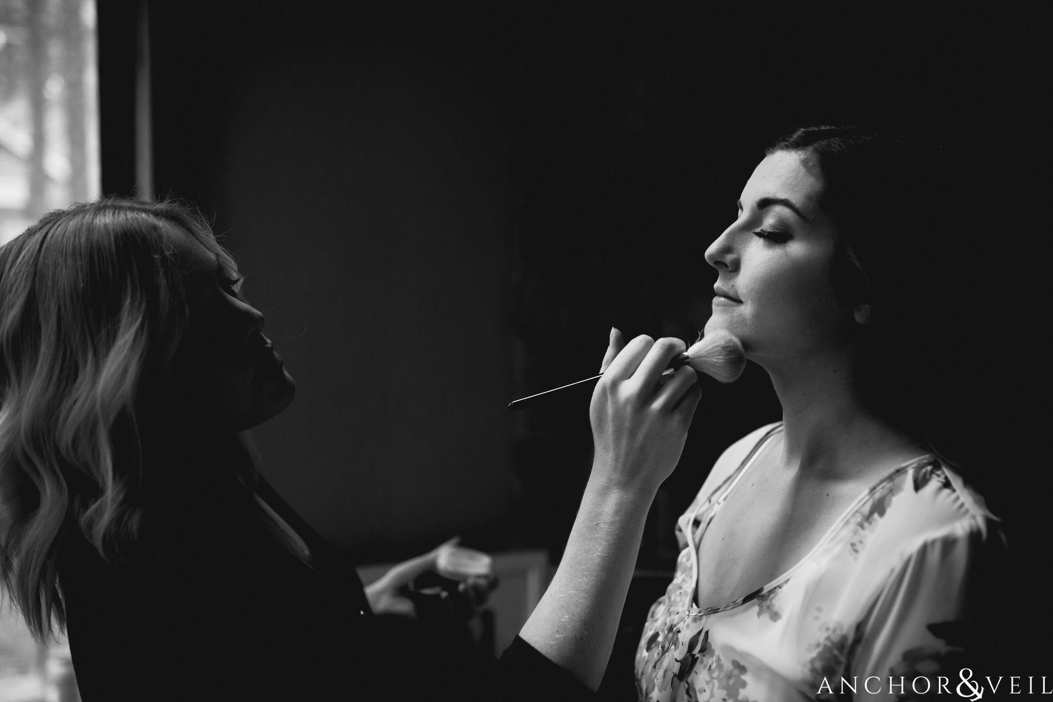 bride getting makeup on during their Horseshoe Bend Elopement Wedding