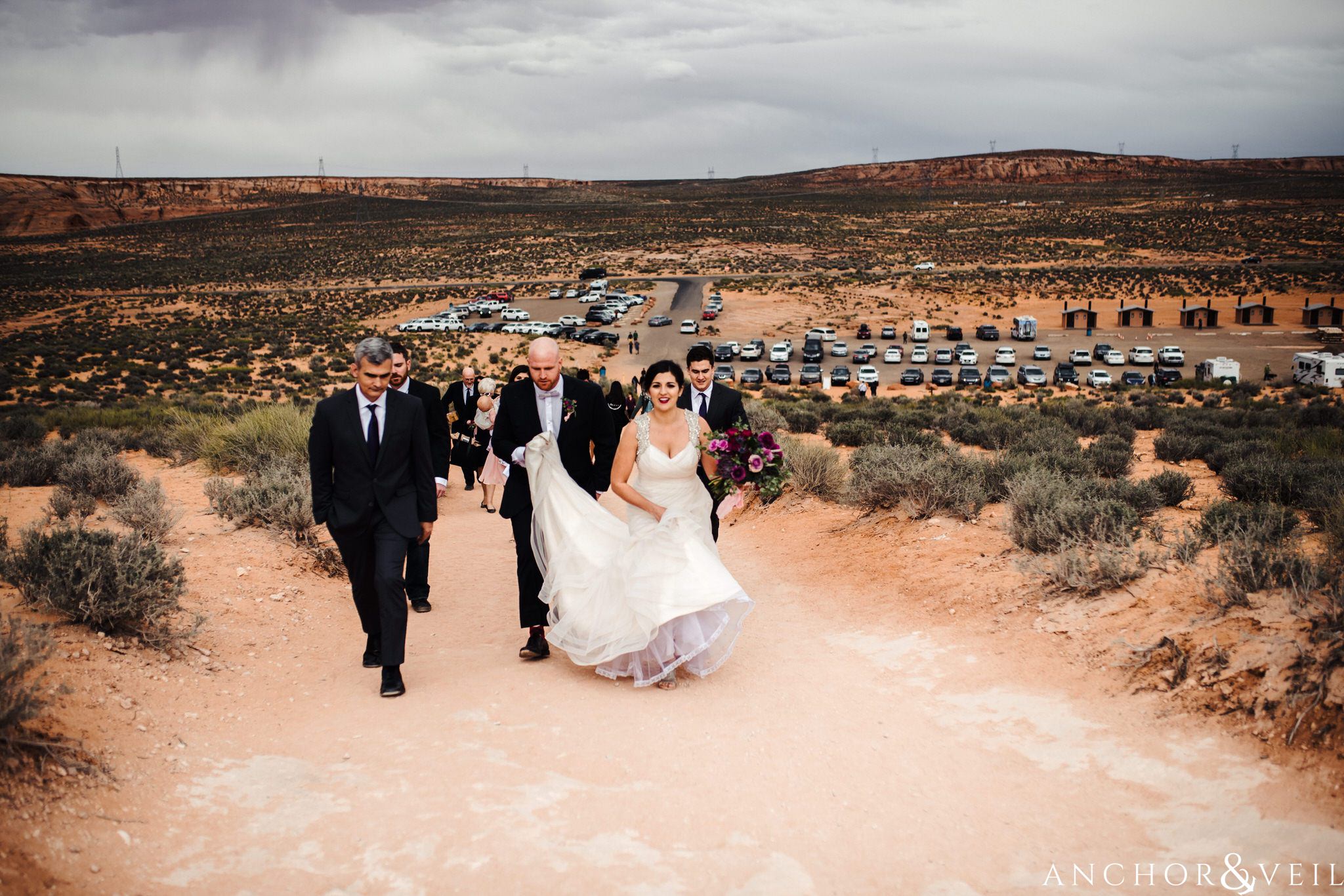 walking up the hill during their Horseshoe Bend Elopement Wedding