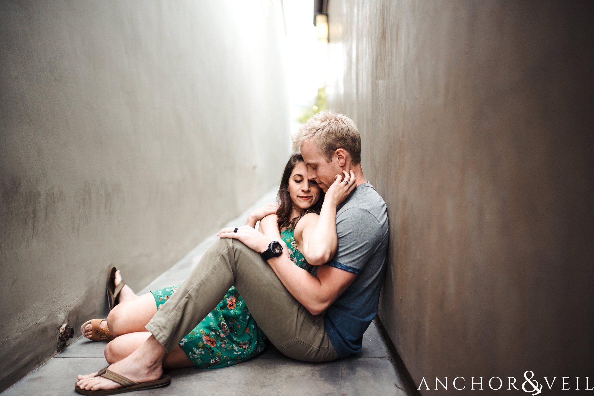in between the buildings during their Laguna Beach Engagement Session 35