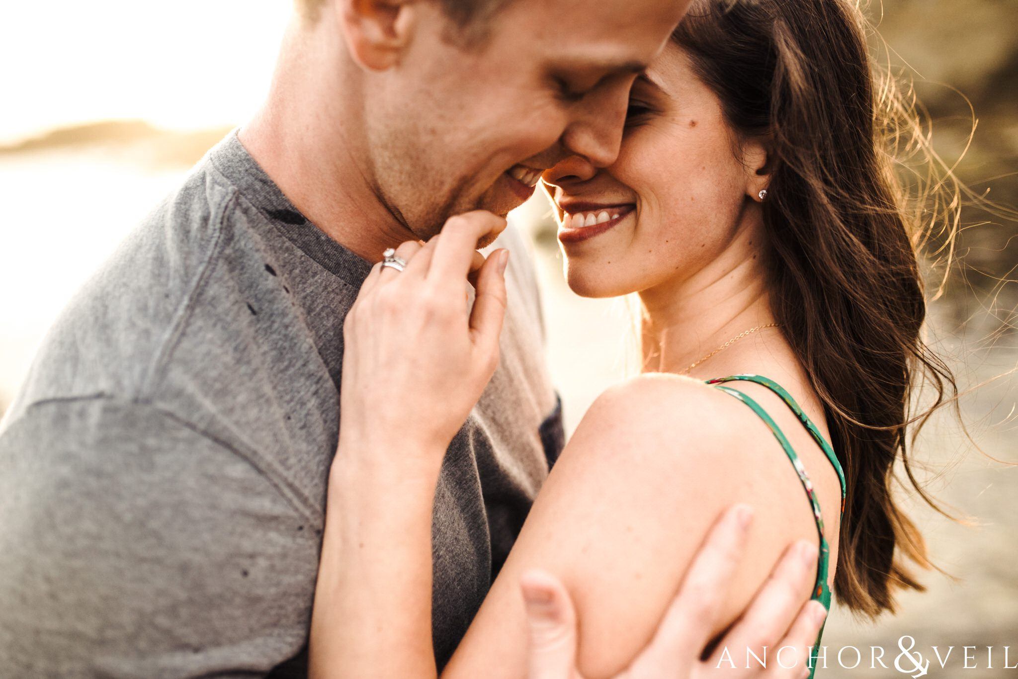 getting in close during their Laguna Beach Engagement Session 
