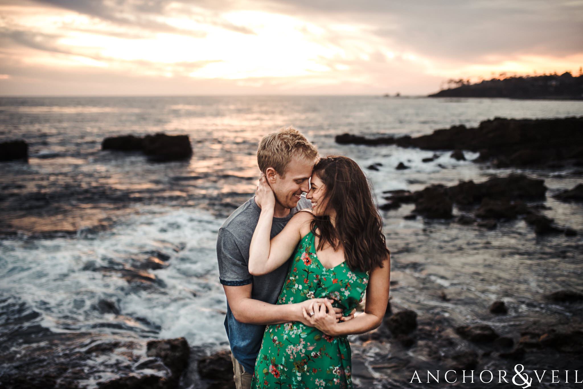 near the water during their Laguna Beach Engagement Session 