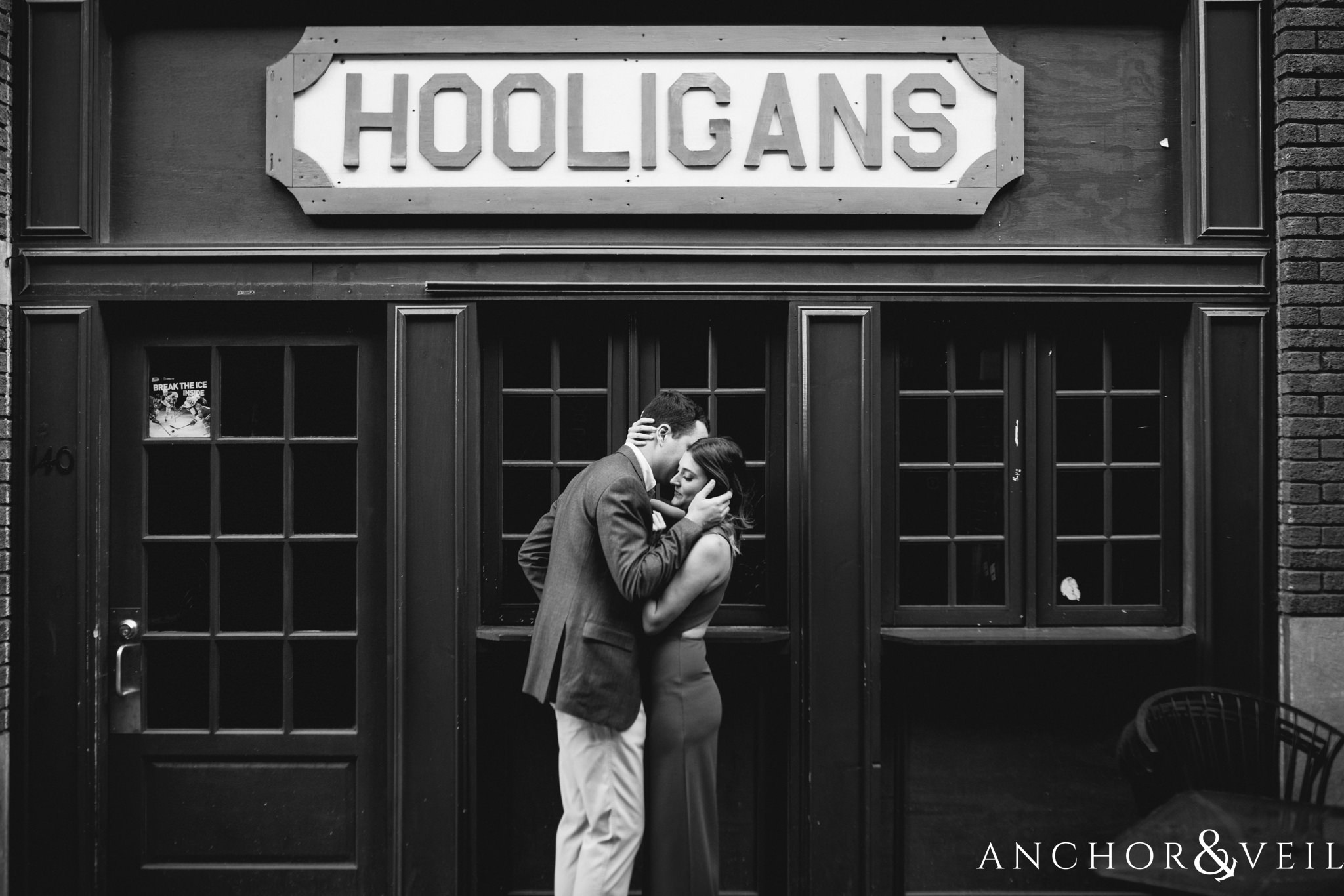 telling secrets during the Uptown Charlotte Sycamore Brewery Engagement Session