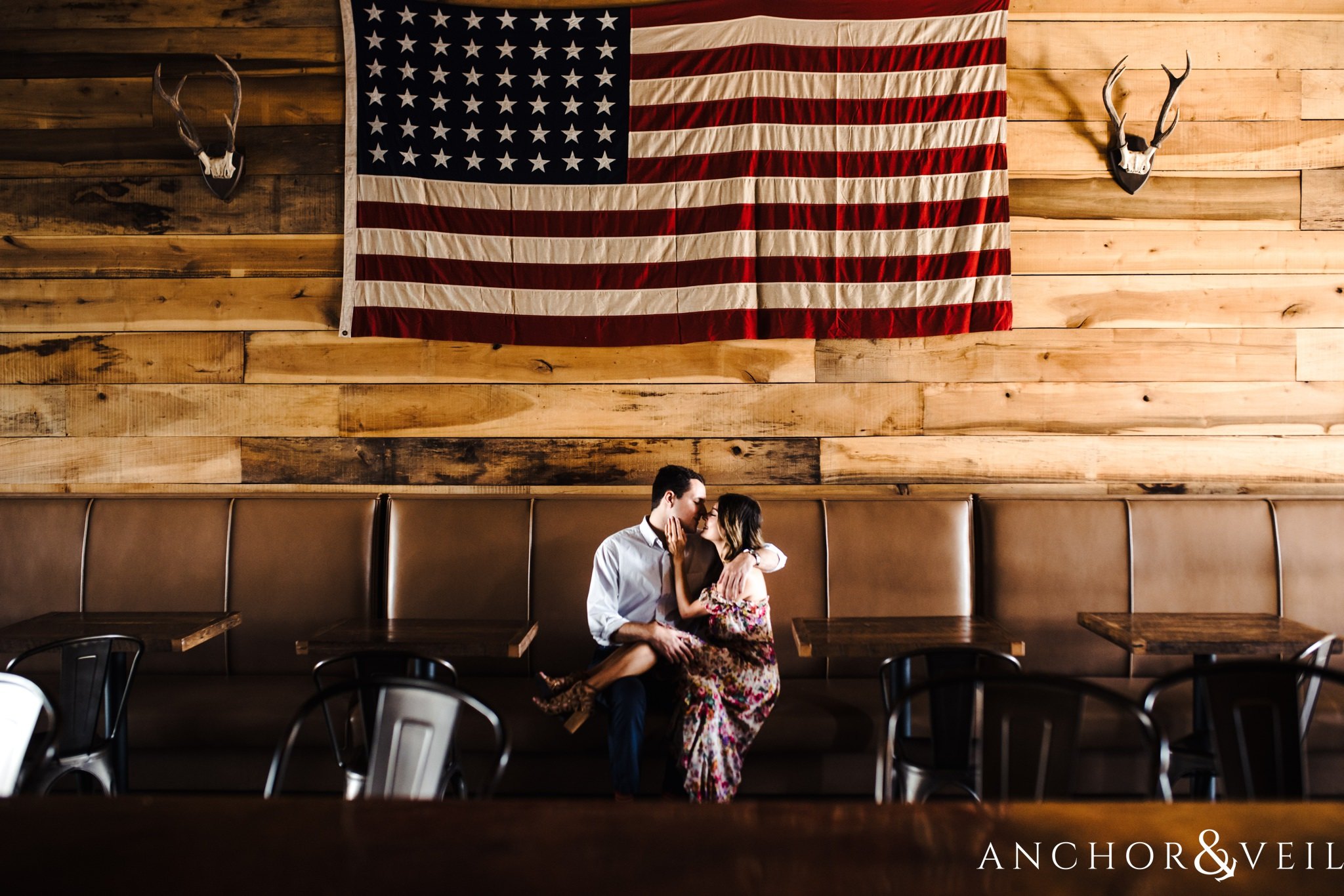 American flag during the Uptown Charlotte Sycamore Brewery Engagement Session