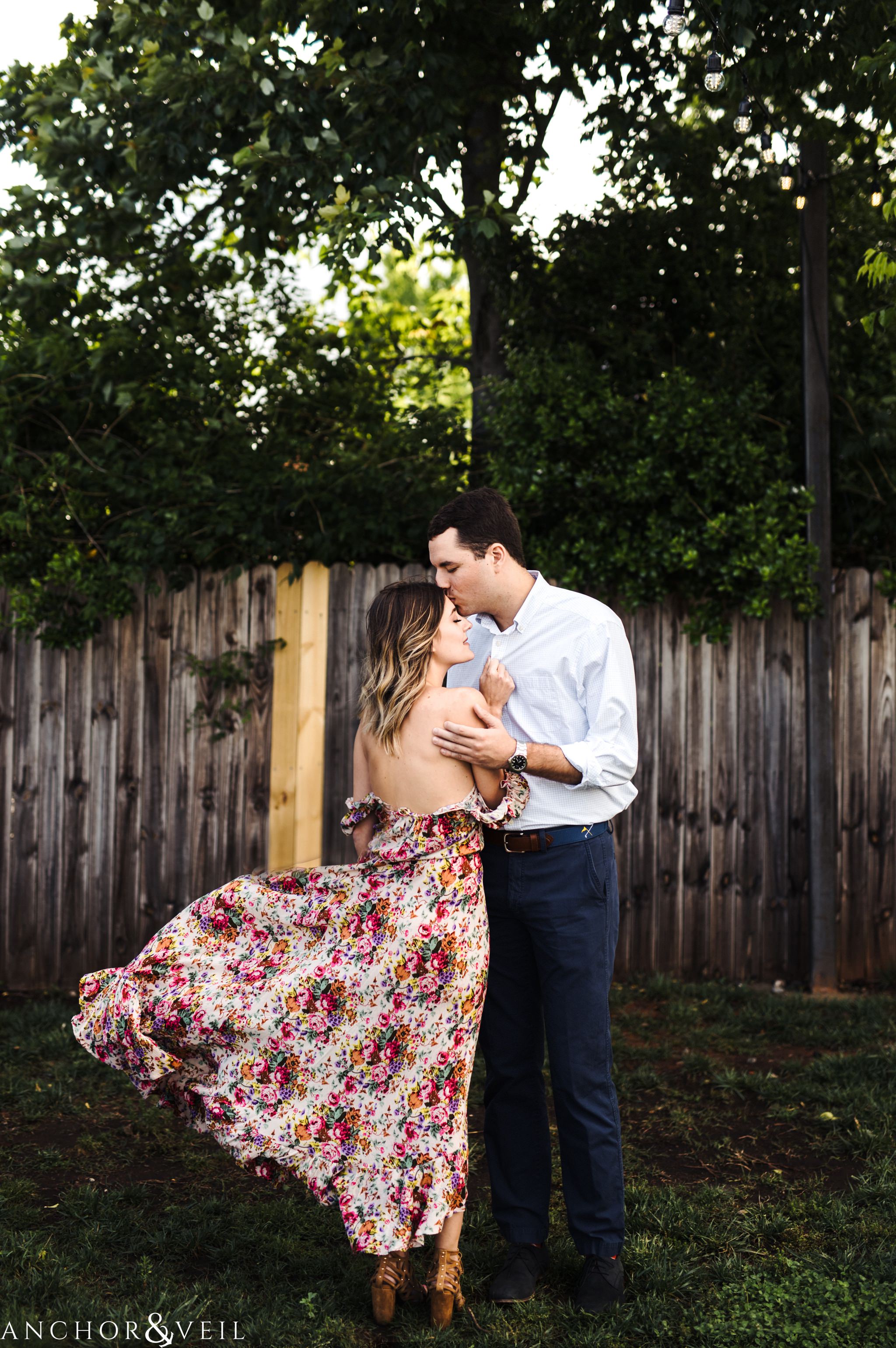 emir blown dress during the Uptown Charlotte Sycamore Brewery Engagement Session
