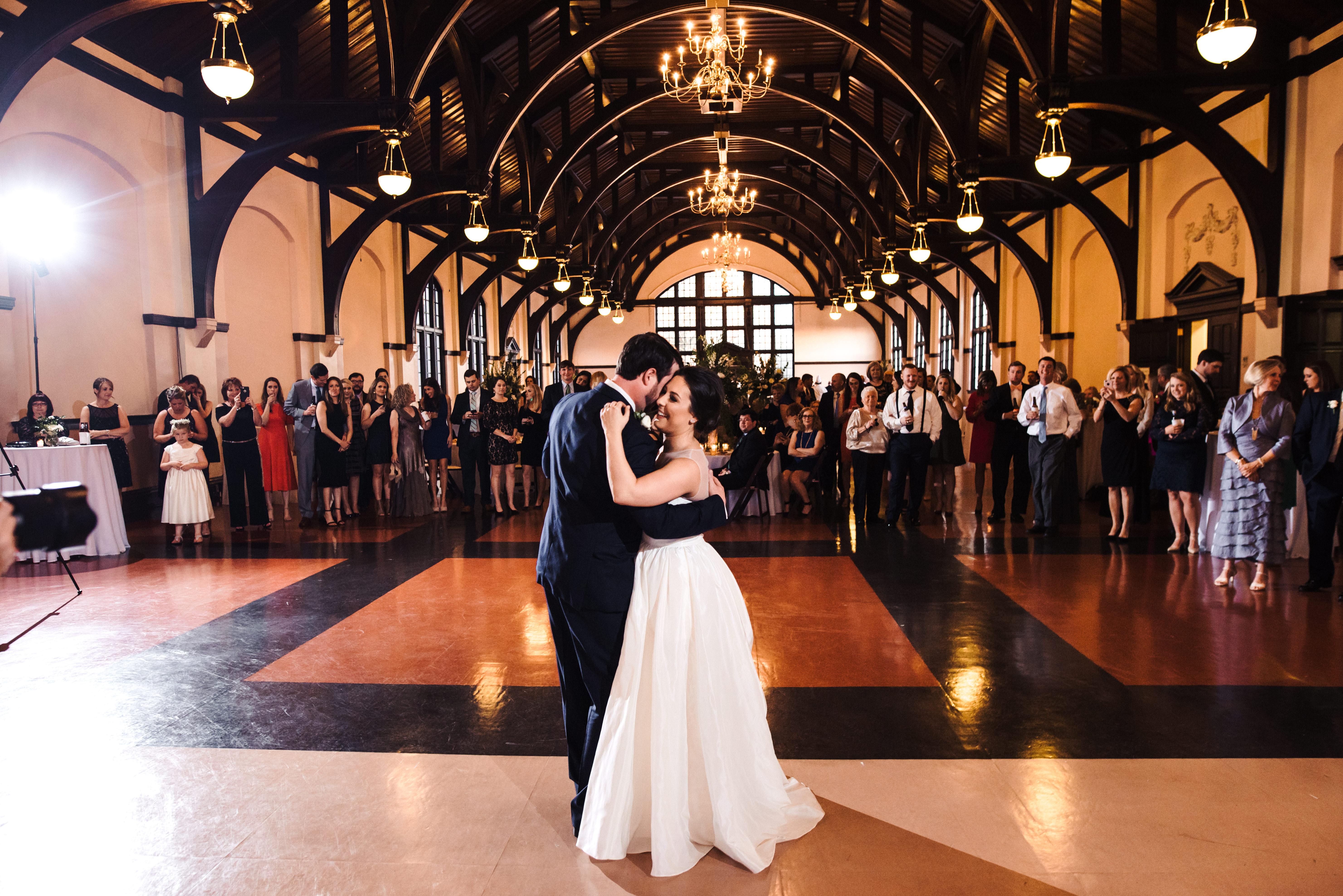 holding each other close during their first dance at mcbryde hall