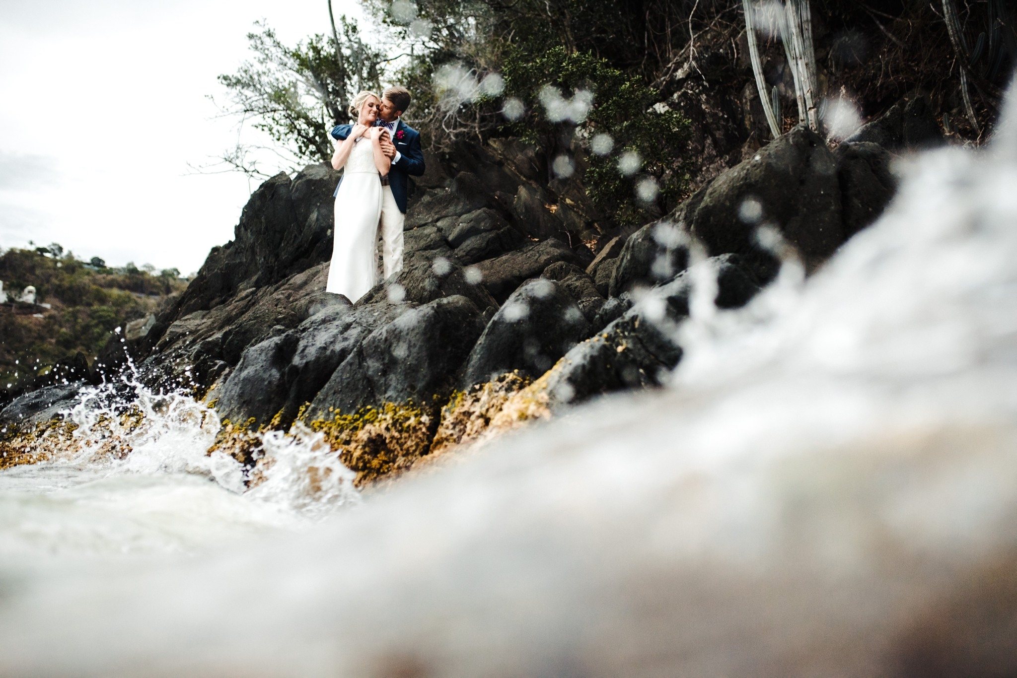 bride and groom portrait on the rocks