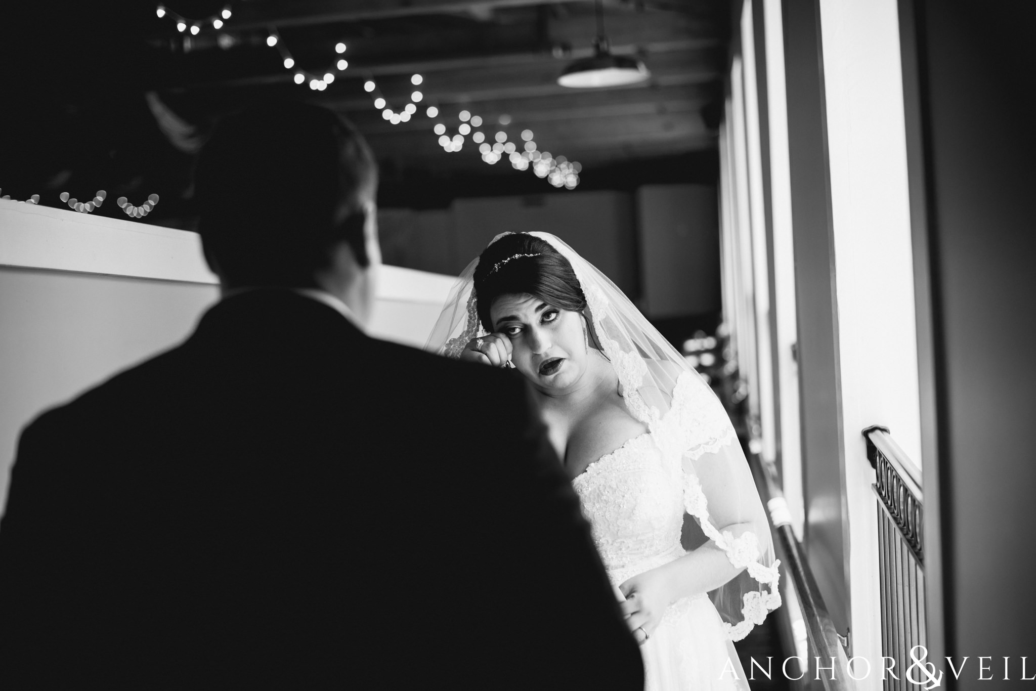 bride crying during first look during their Laboratory Mill Wedding
