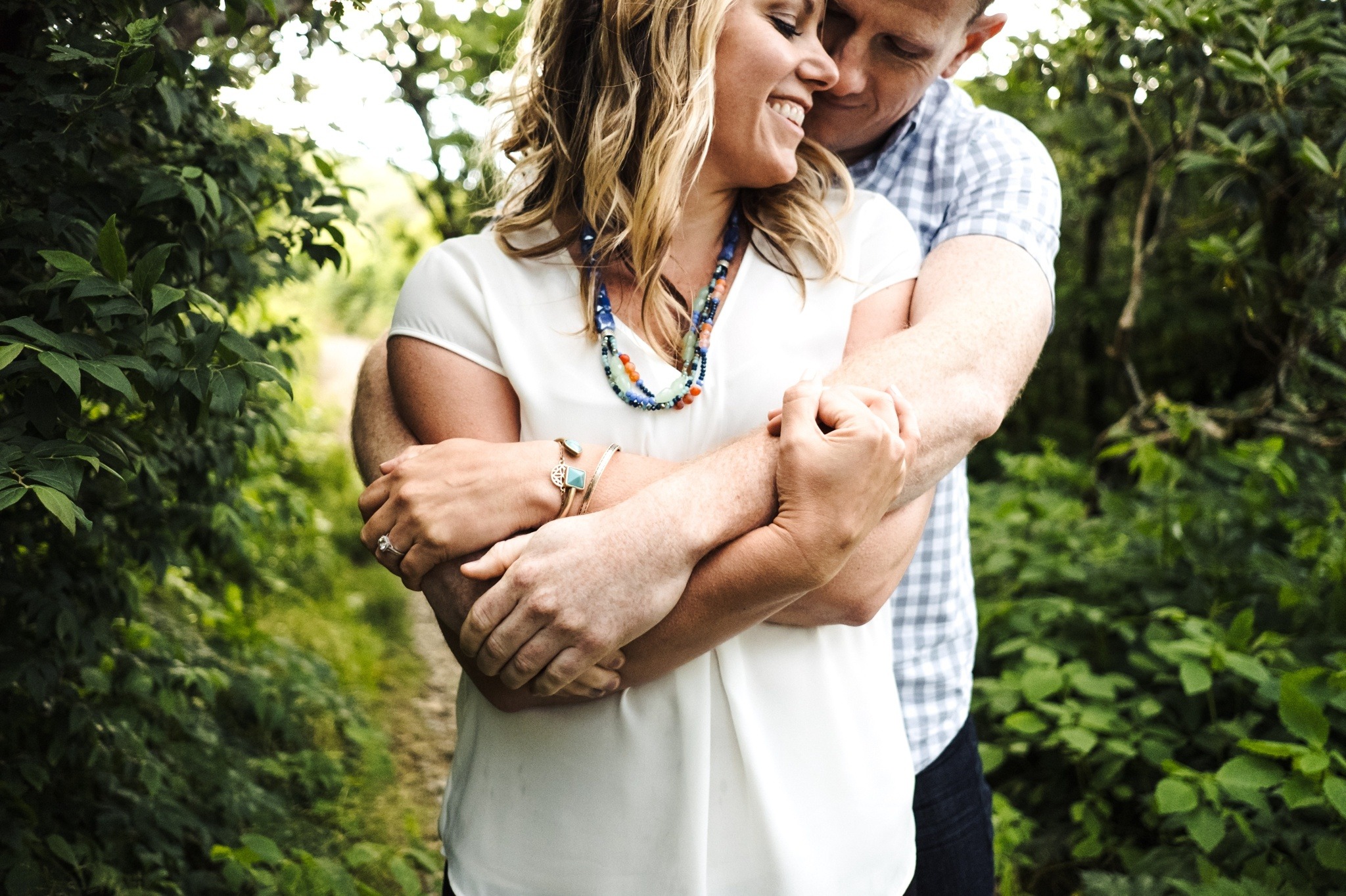 romantic cuddle from the couple during the Craggy Gardens Engagement Session