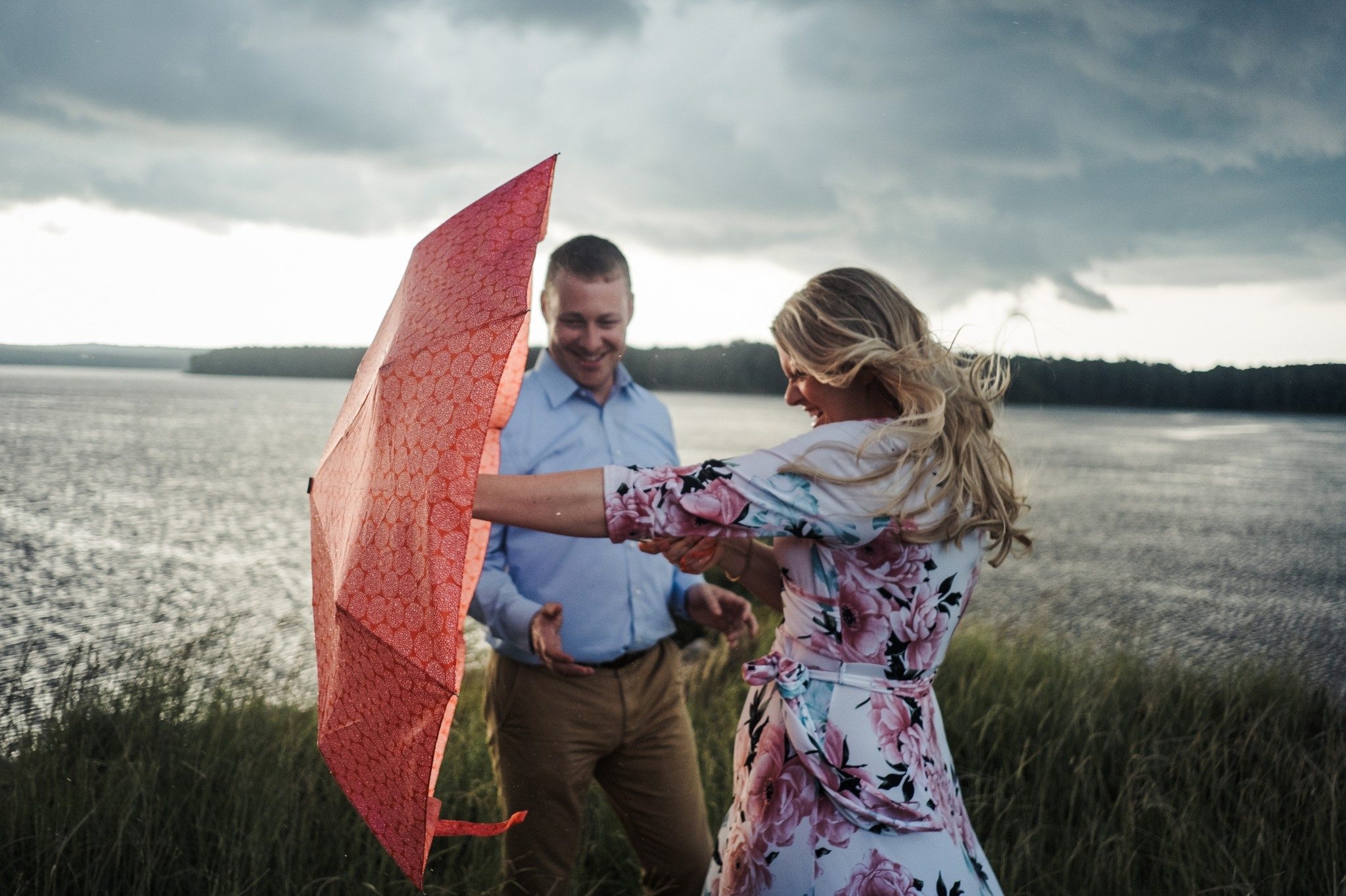 a storm is not going to stop these two from sharing sweet moments together during their Apex Engagement Session