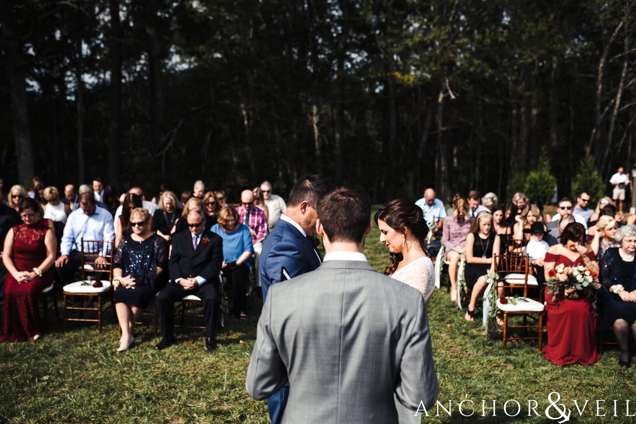 the ceremony during her The Venue Wedding in Asheville