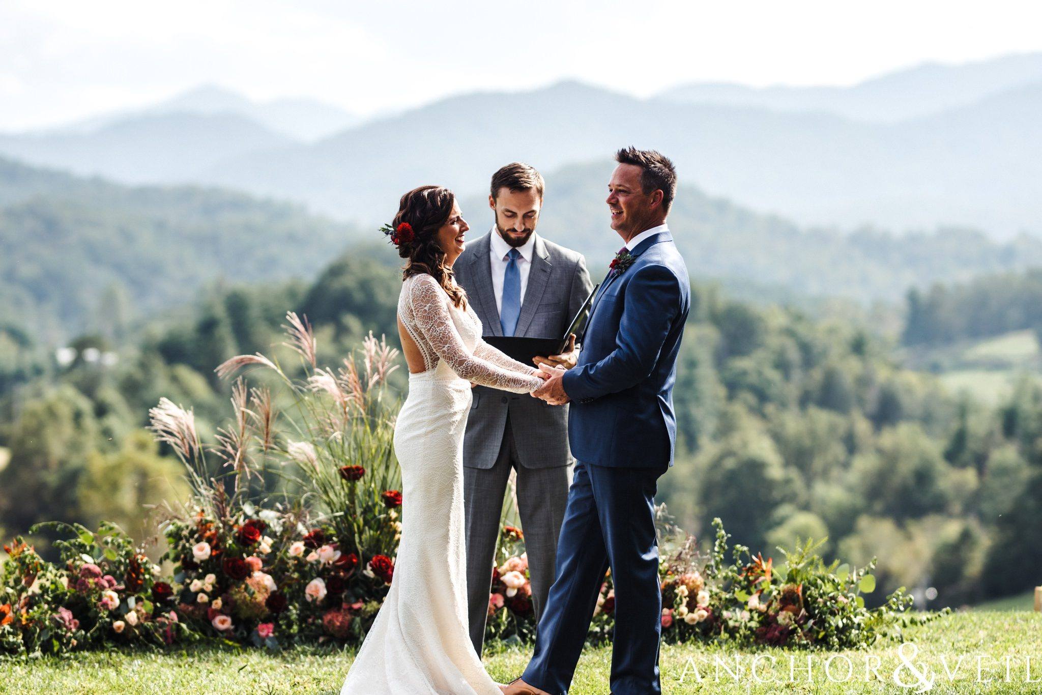 mountain background during the ceremony during her The Venue Wedding in Asheville