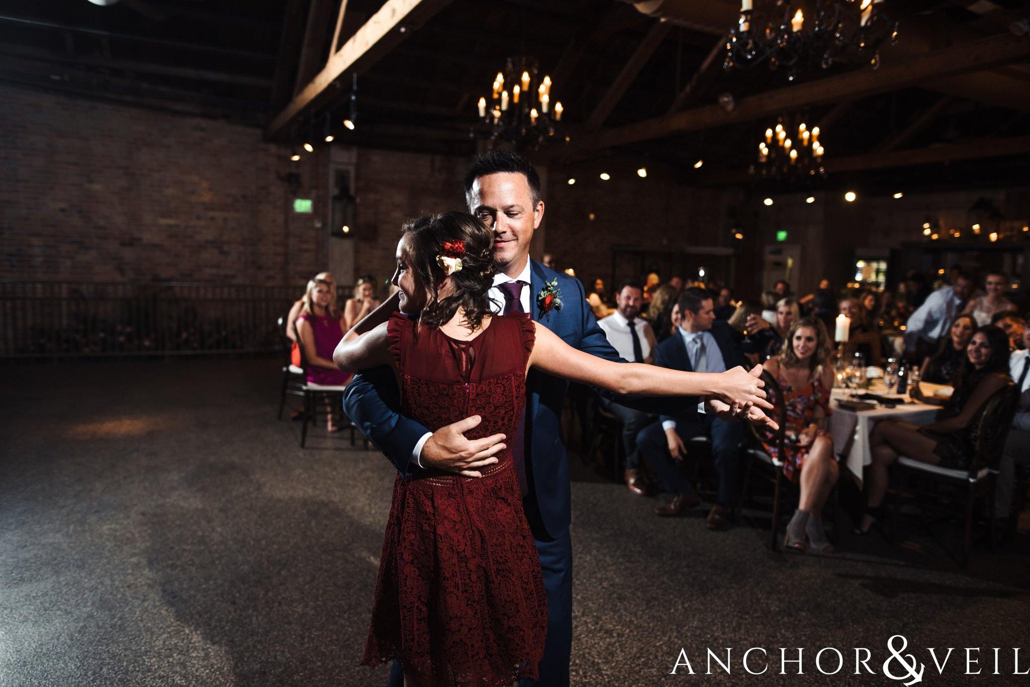 dance with his daughter during her The Venue Wedding in Asheville