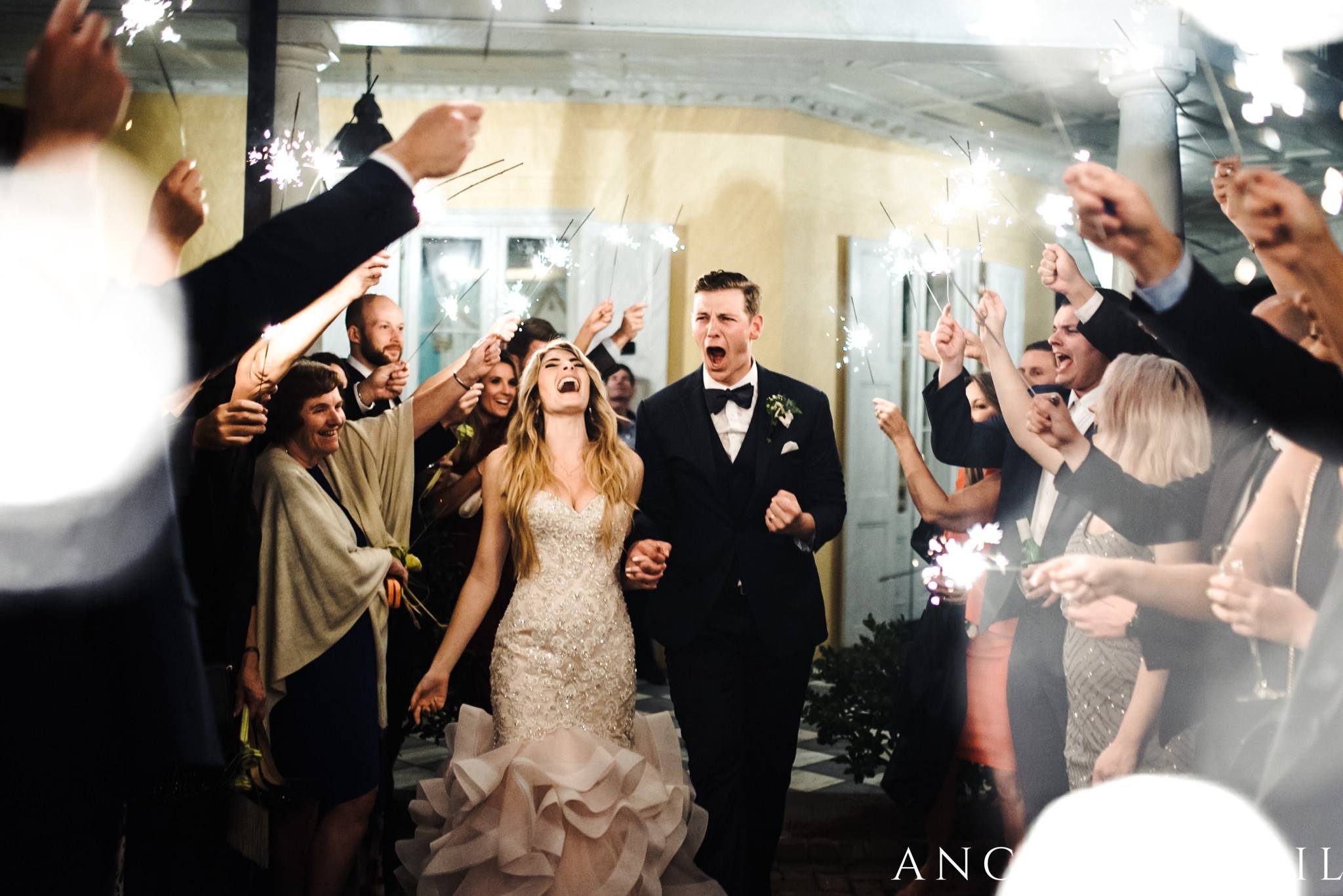yelling sparkler exit during their William Aiken house Wedding in Charleston Sc