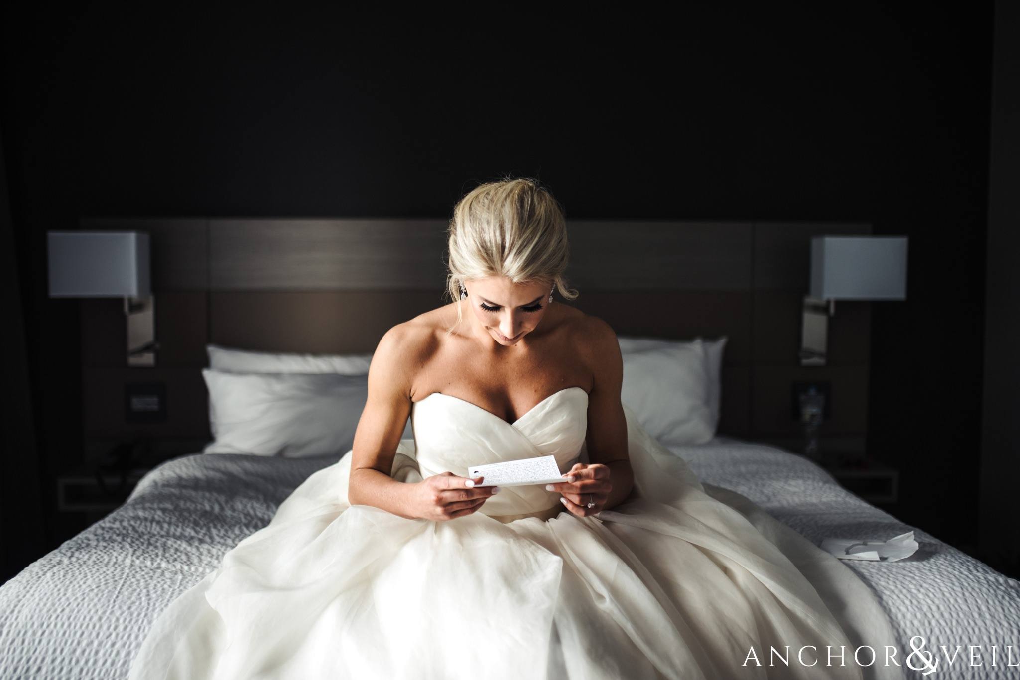 reading the love letter during their Downtown Asheville Wedding