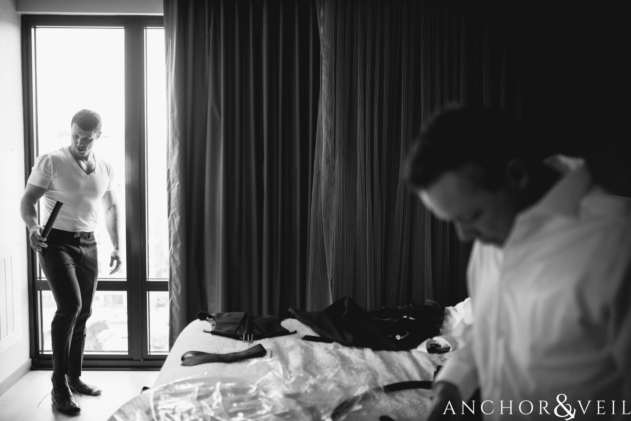 groom and father getting ready during their Downtown Asheville Wedding 