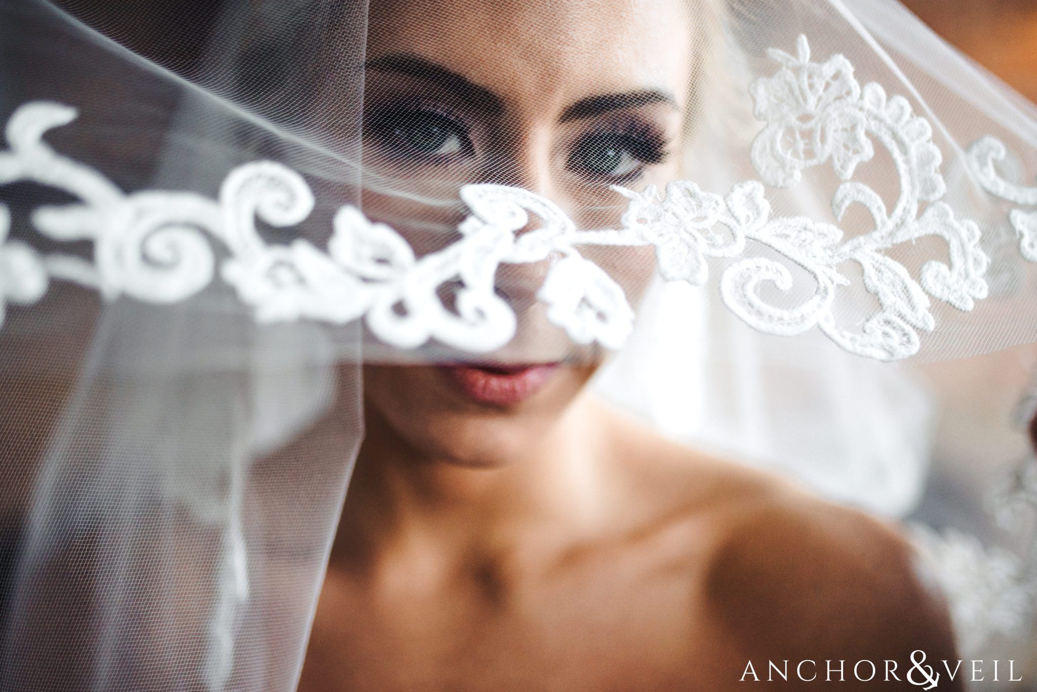 the lace on the veil during their Downtown Asheville Wedding