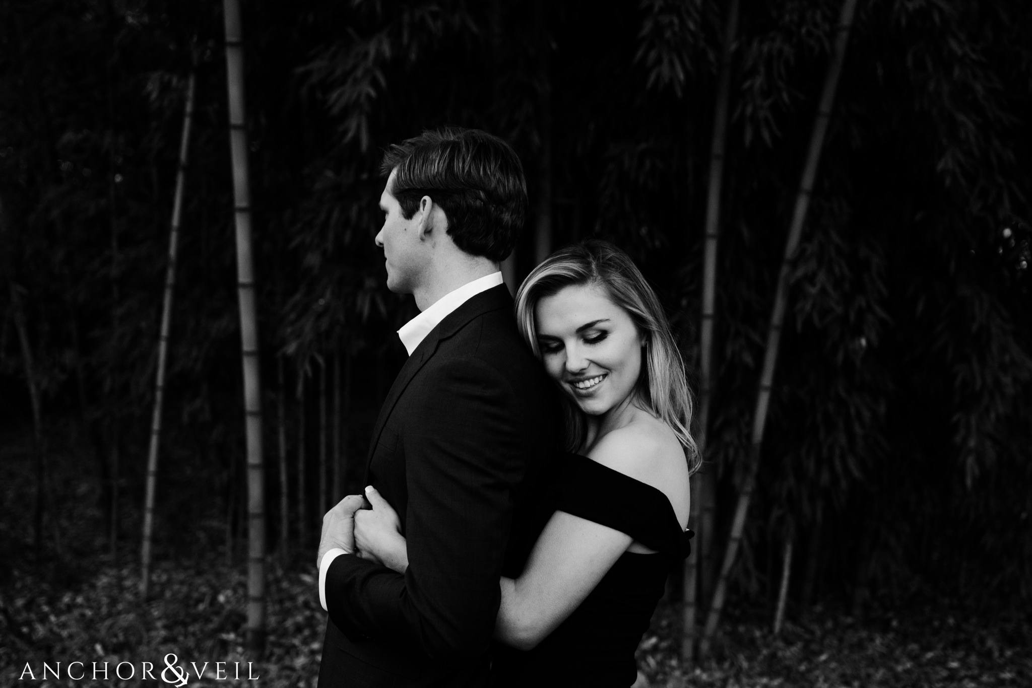 Holding him tight from behind during their Dale Earnhardt Inc Engagement Session Mooresville