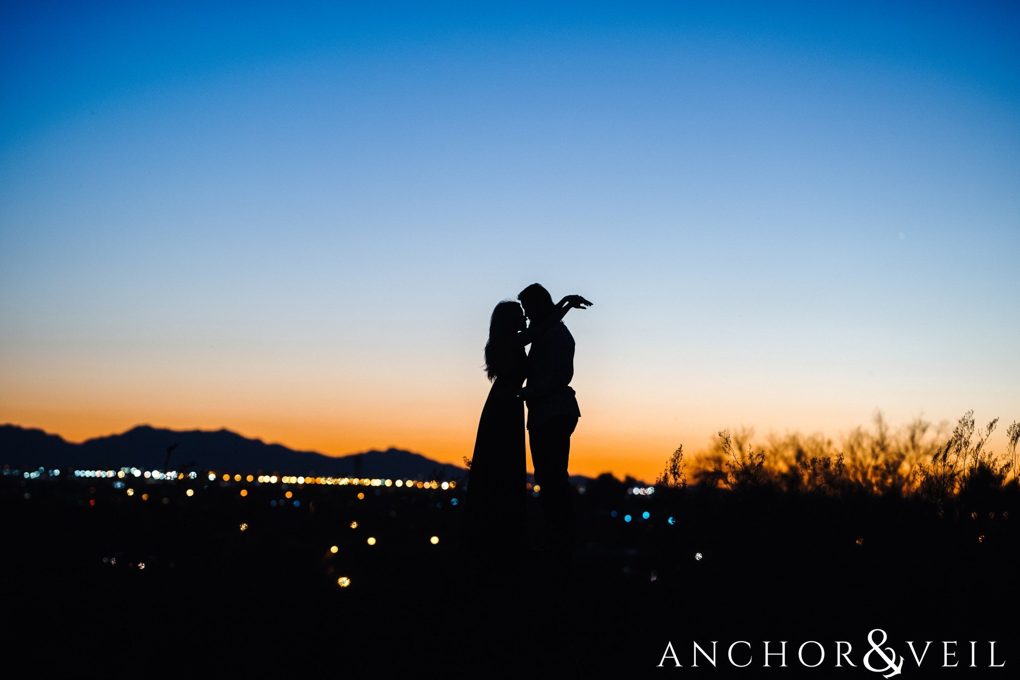 Arizona city silhouette during their spring training Arizona Papago park engagement session