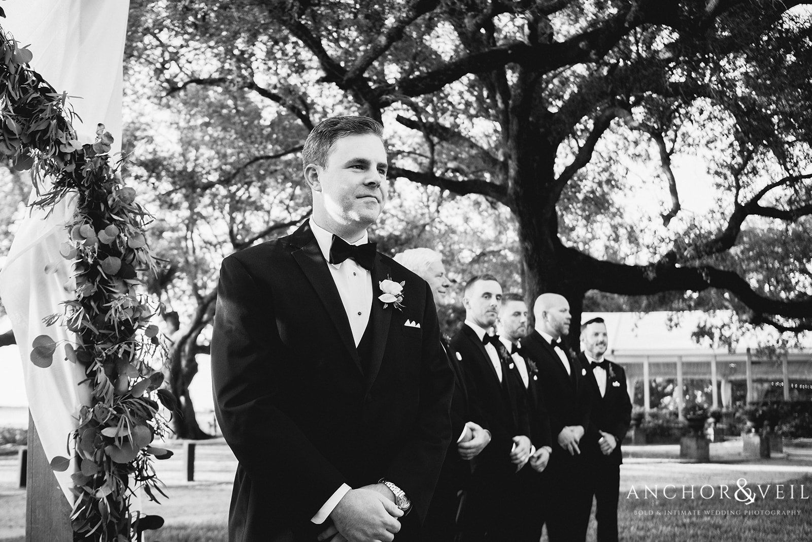 The groom waiting for his bride at the Lowndes Grove Plantation Wedding
