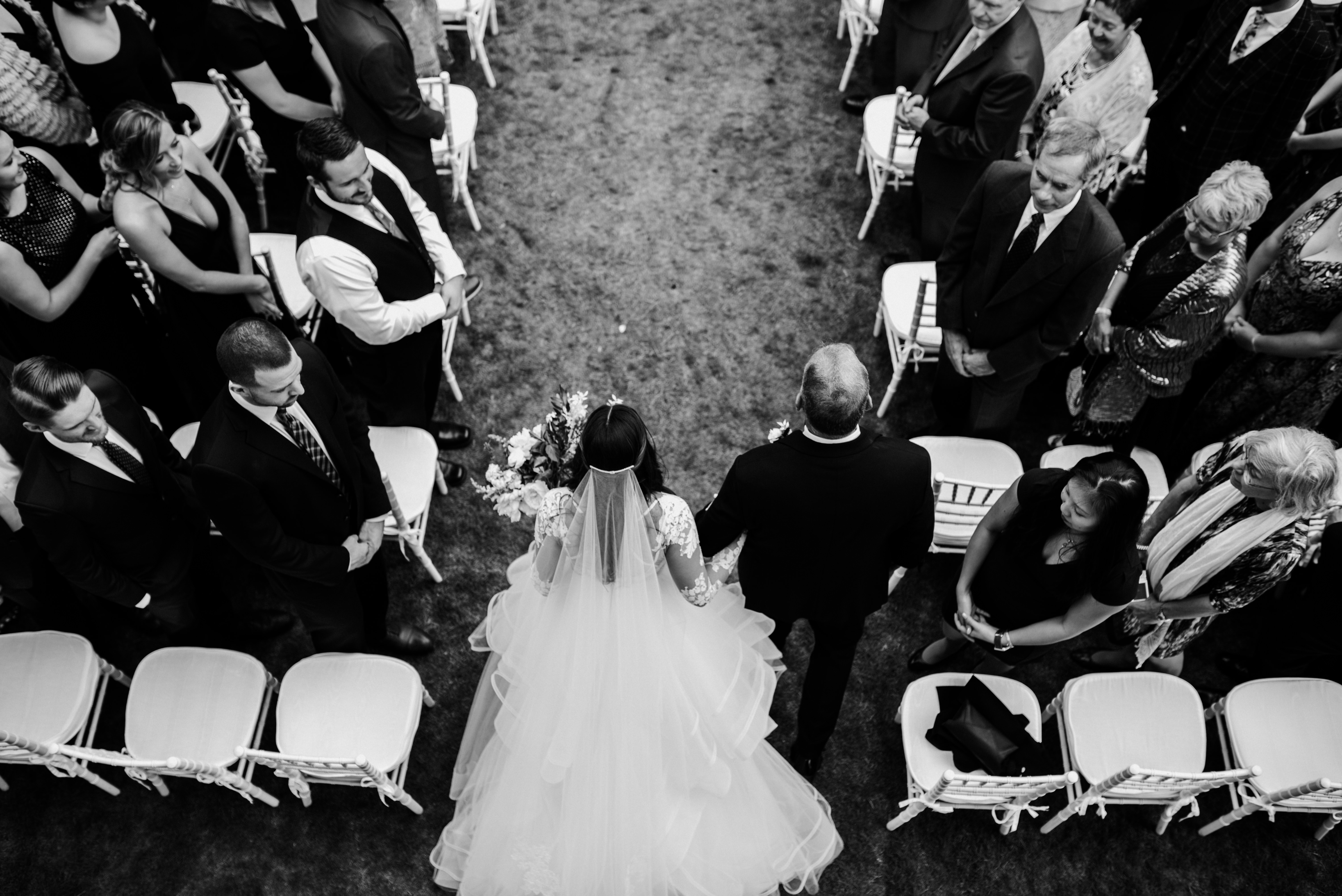 An overhead view of the bride and dad walking down the aisle at the William Aiken House Wedding 