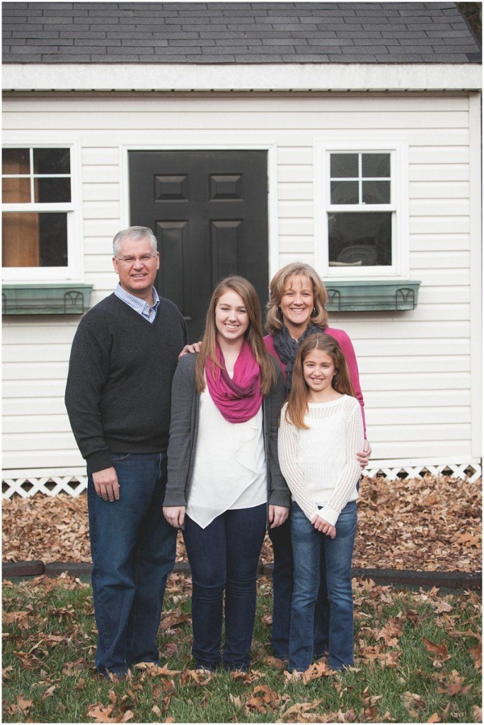 the family standing in front of the shed dad made Charlotte north carolina fall family photography session