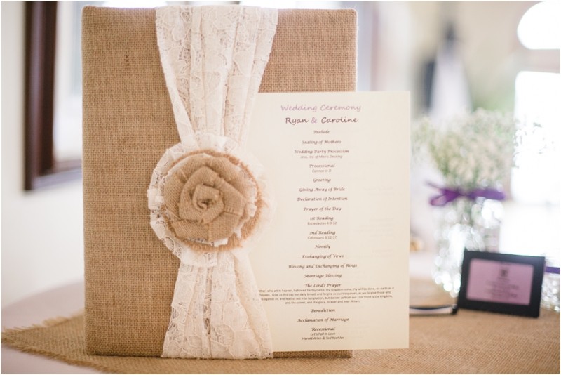 Burlap flowers and guestbook at the wedding at the Charleston Yacht Club during a destination wedding in Charleston South Carolina near the ocean