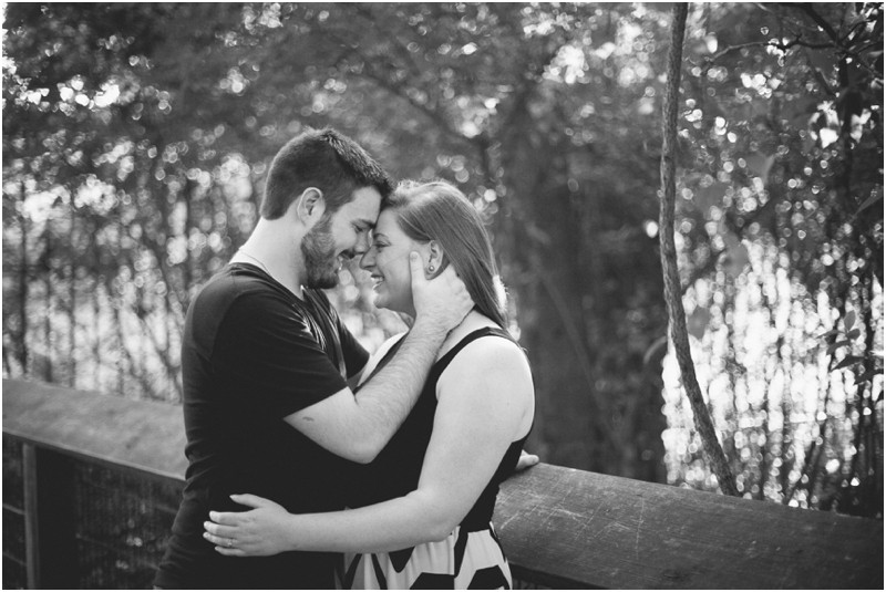 On the bridge at the Three River Greenway in Columbia South Carolina During their engagement session