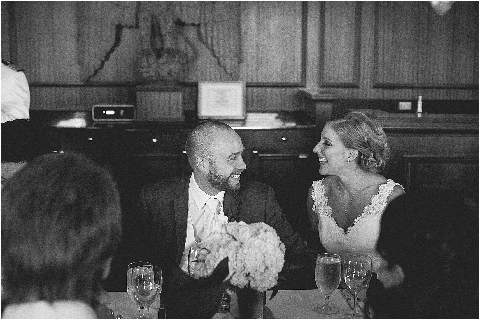 the look of love during the reception at the Charlotte City Club wedding in charlotte North Carolina