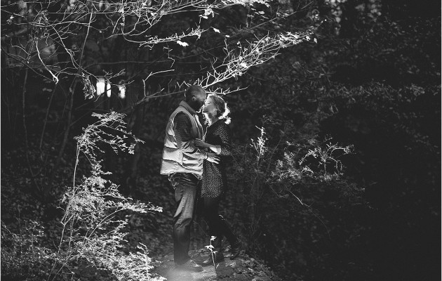 Lighting up the woods in an intimate back light with ice light in the woods during their matthews north Carolina engagement session