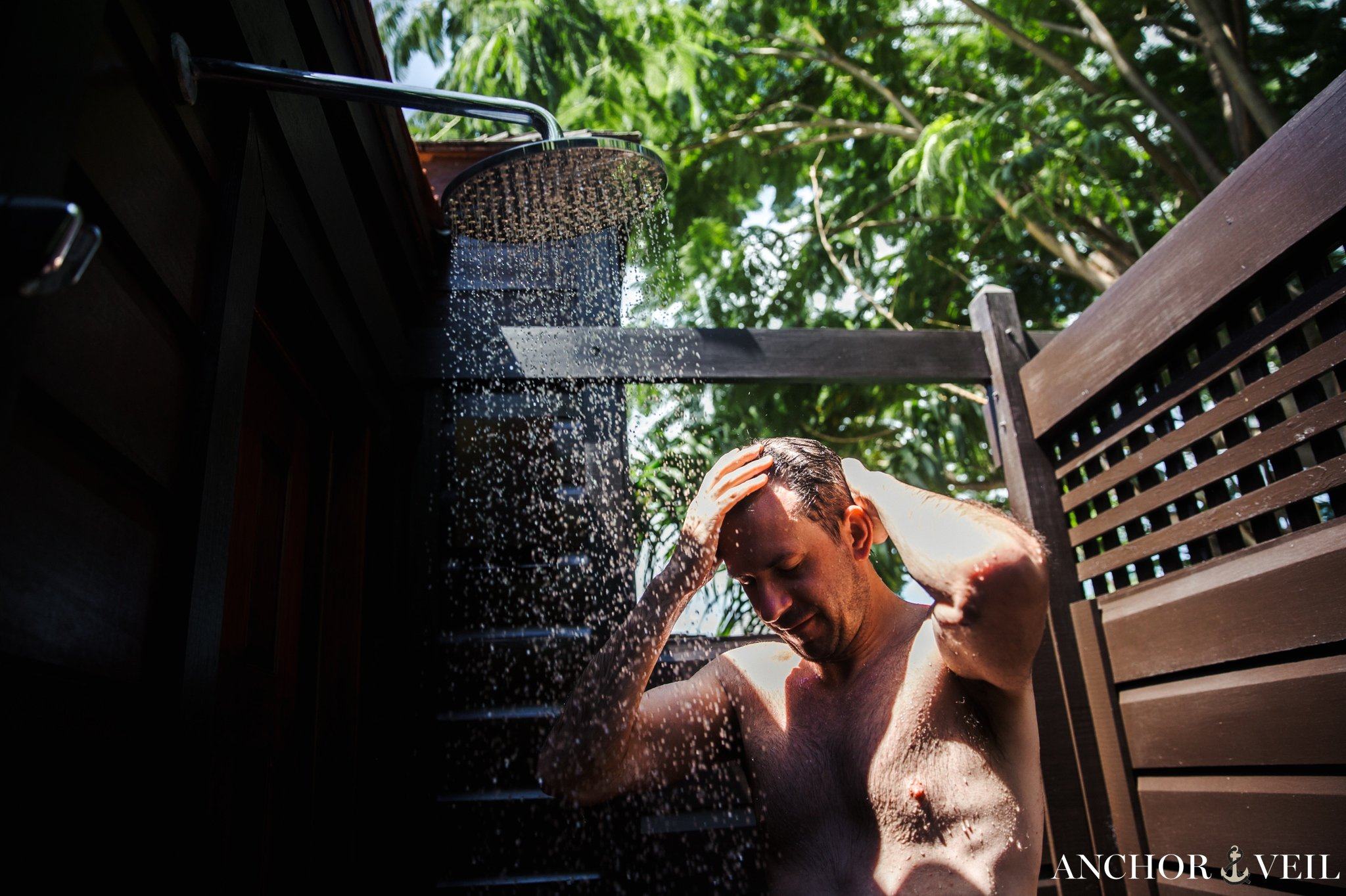 Groom showering before the Hermitage Bay Antigua Wedding